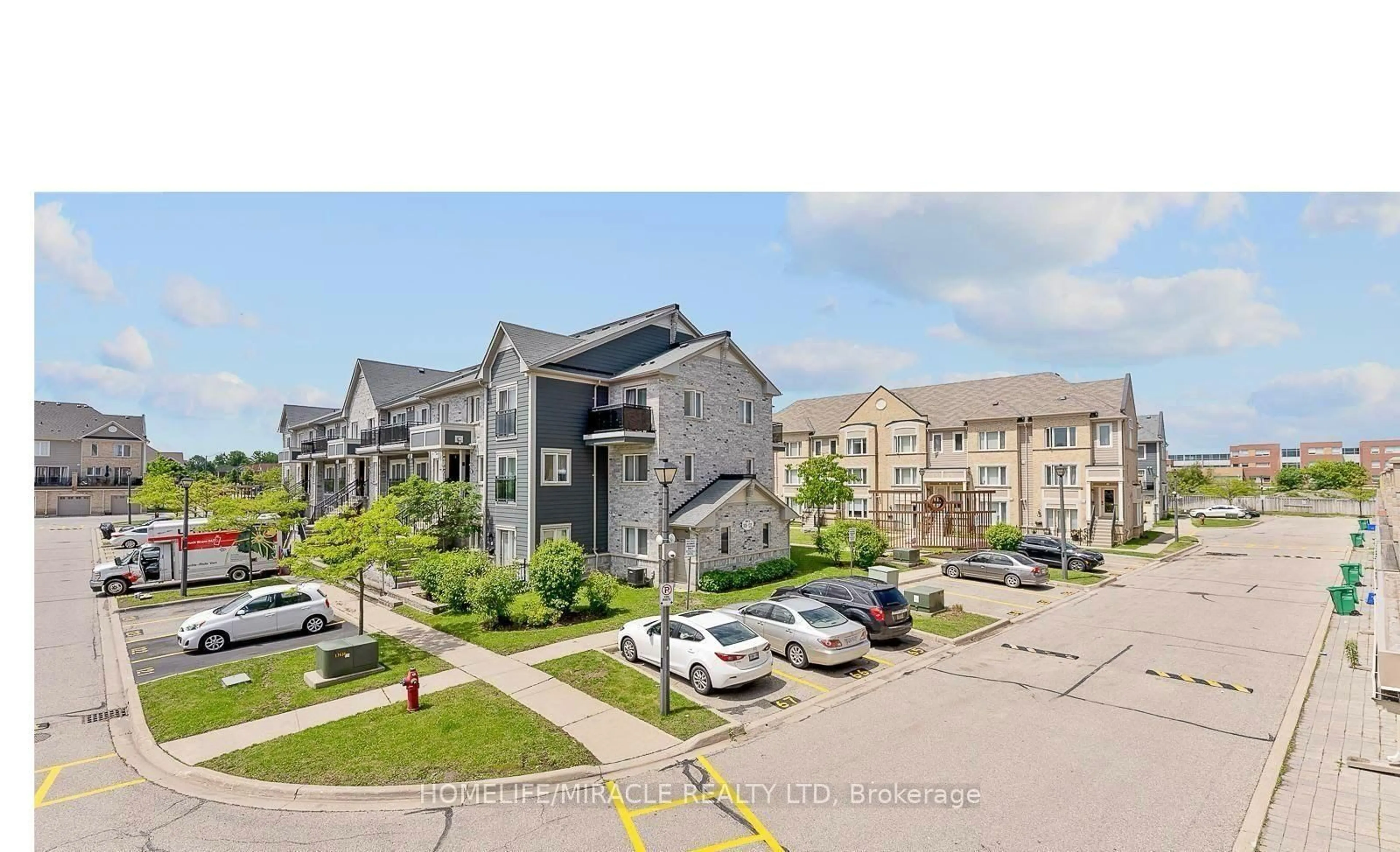 A pic from outside/outdoor area/front of a property/back of a property/a pic from drone, street for 60 Fairwood Circ #61, Brampton Ontario L6R 0Y6