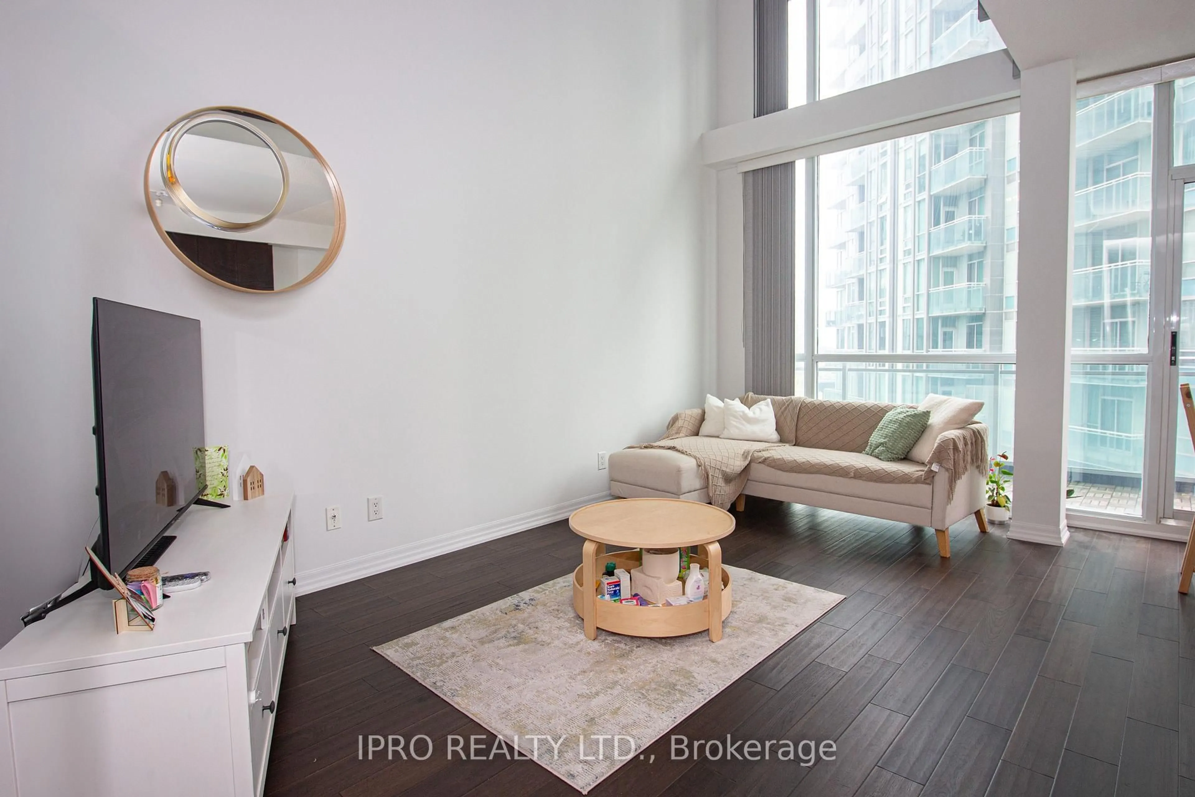 Living room with furniture, unknown for 223 Webb Dr #1701, Mississauga Ontario L5B 0E8