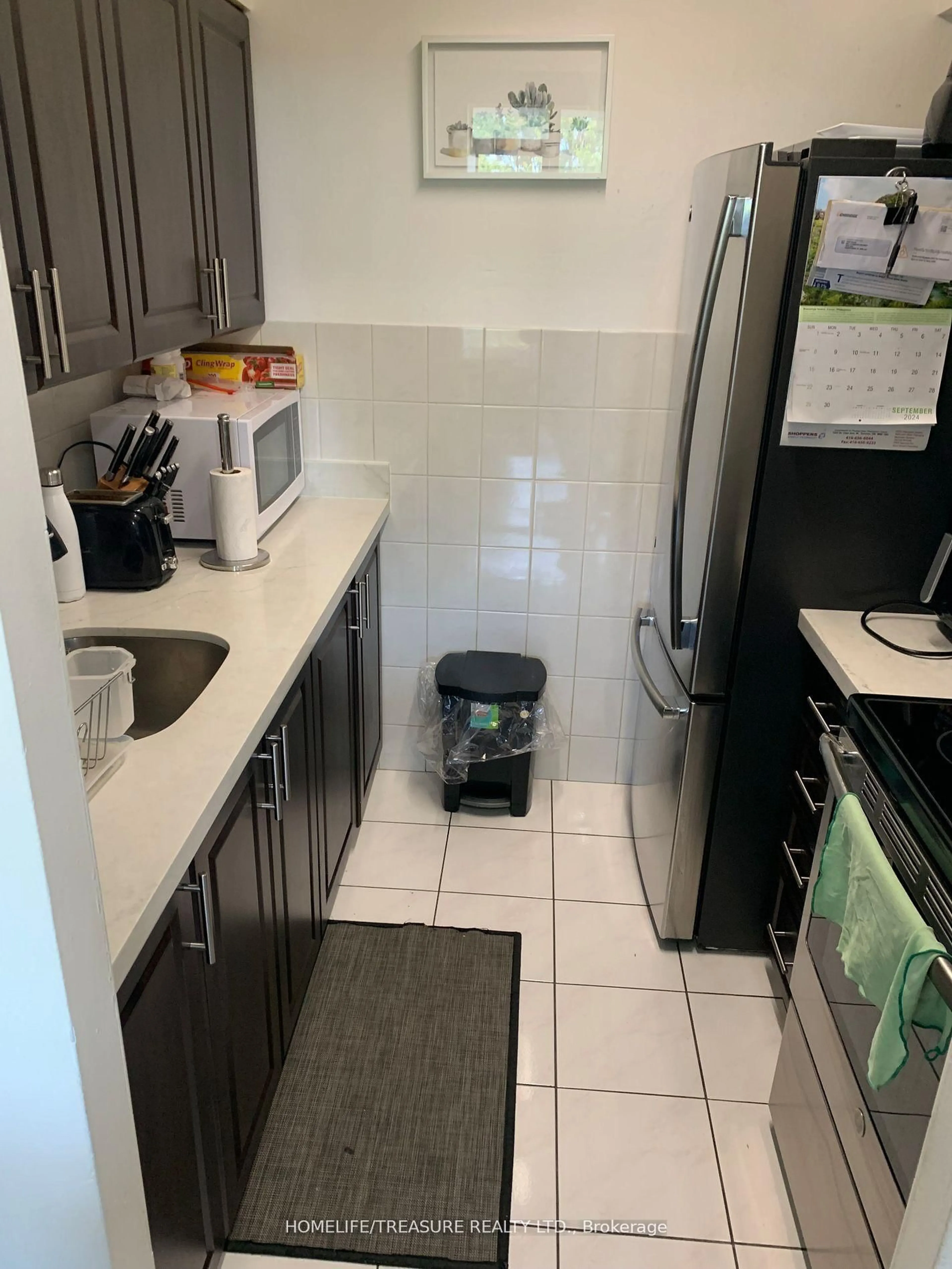 Standard kitchen, ceramic/tile floor for 200 Lotherton Ptwy #609, Toronto Ontario M6B 2G9