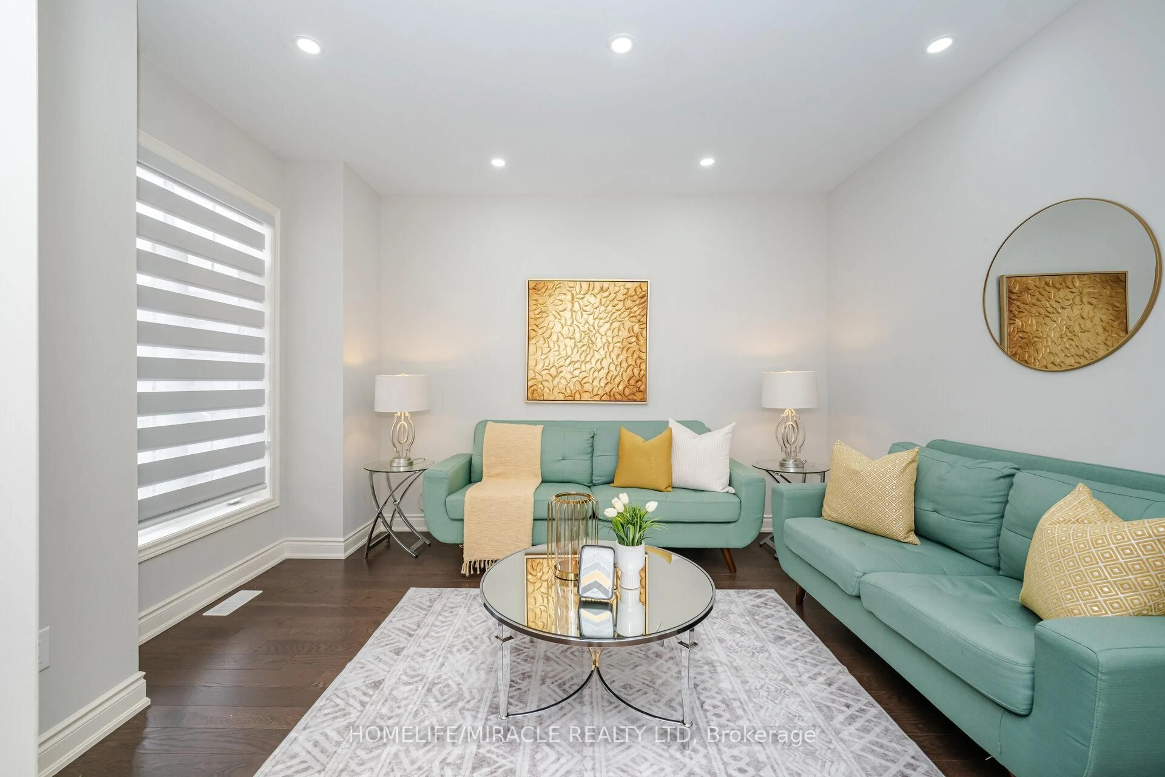 Living room with furniture, wood/laminate floor for 23 Elverton Cres, Brampton Ontario L7A 4Z4