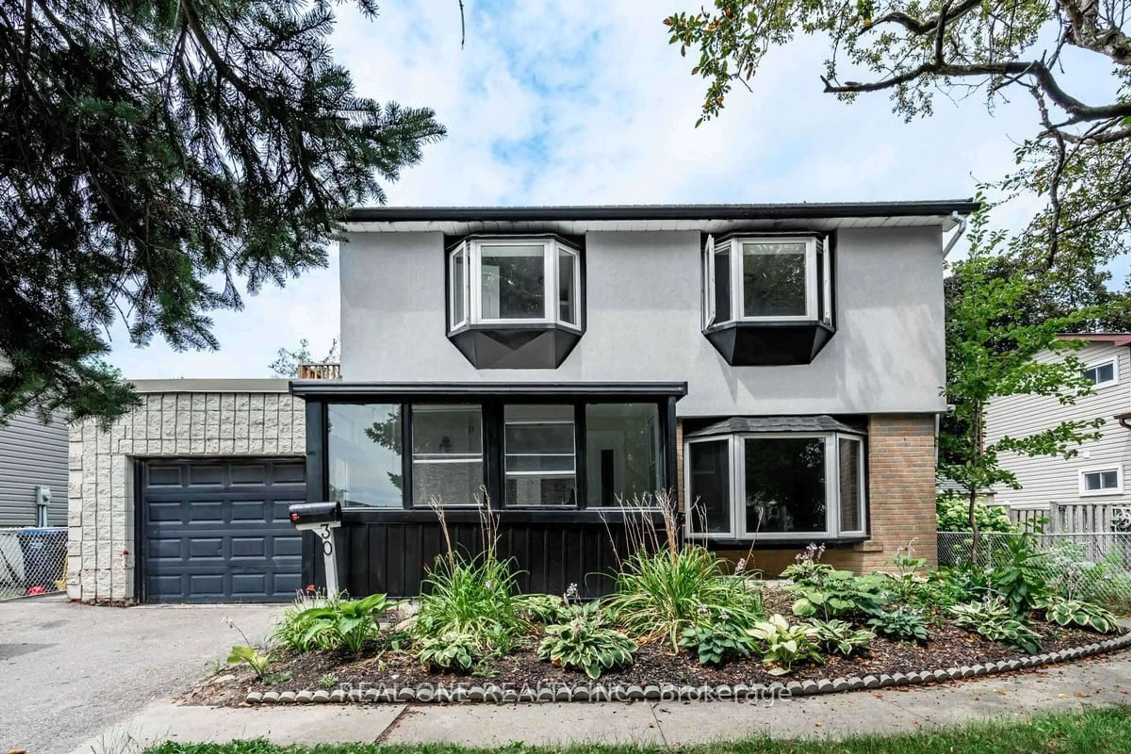 Home with brick exterior material, street for 30 Herkley Dr, Brampton Ontario L6V 2E8