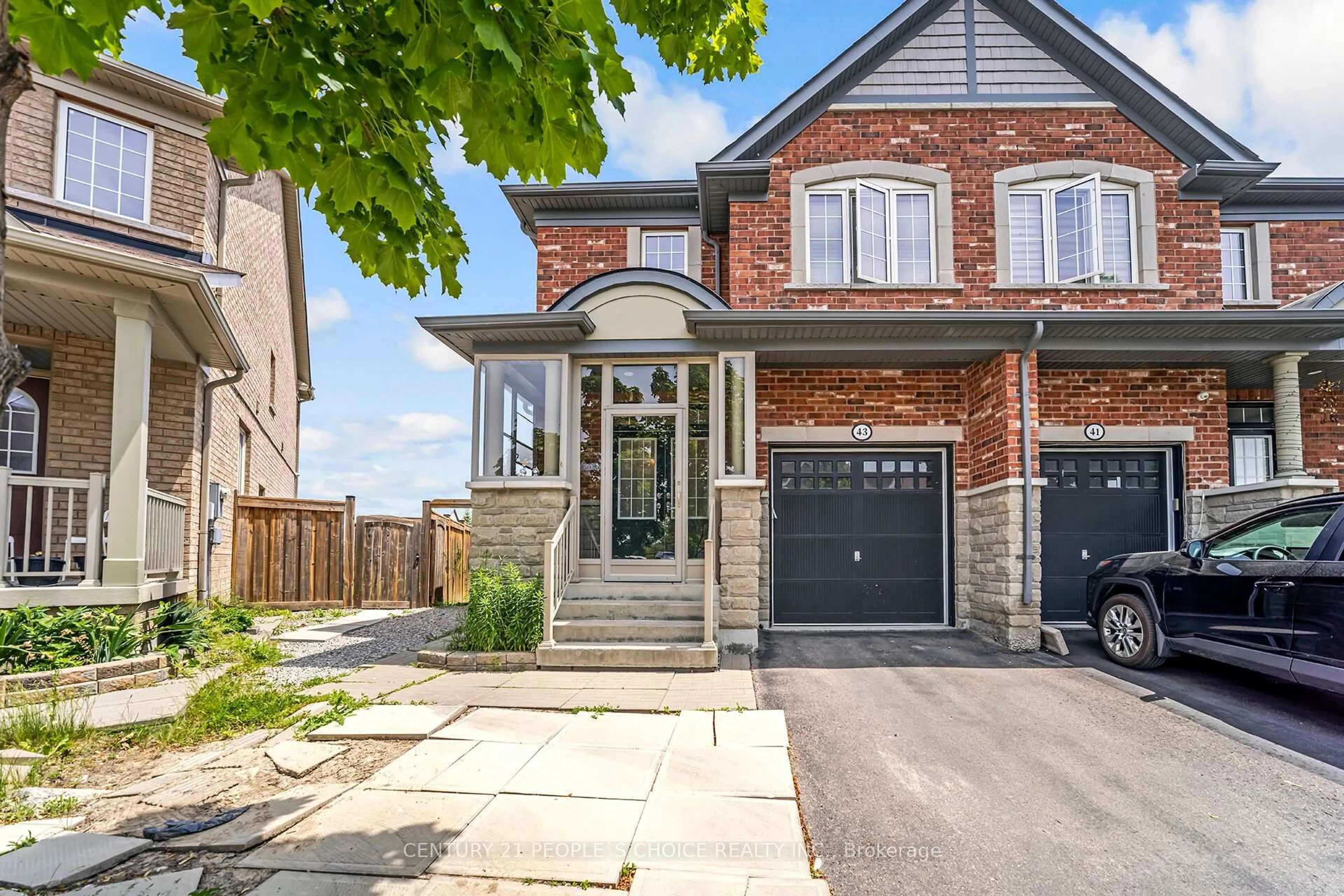 Home with brick exterior material, street for 43 Sussexvale Dr, Brampton Ontario L6R 3R5