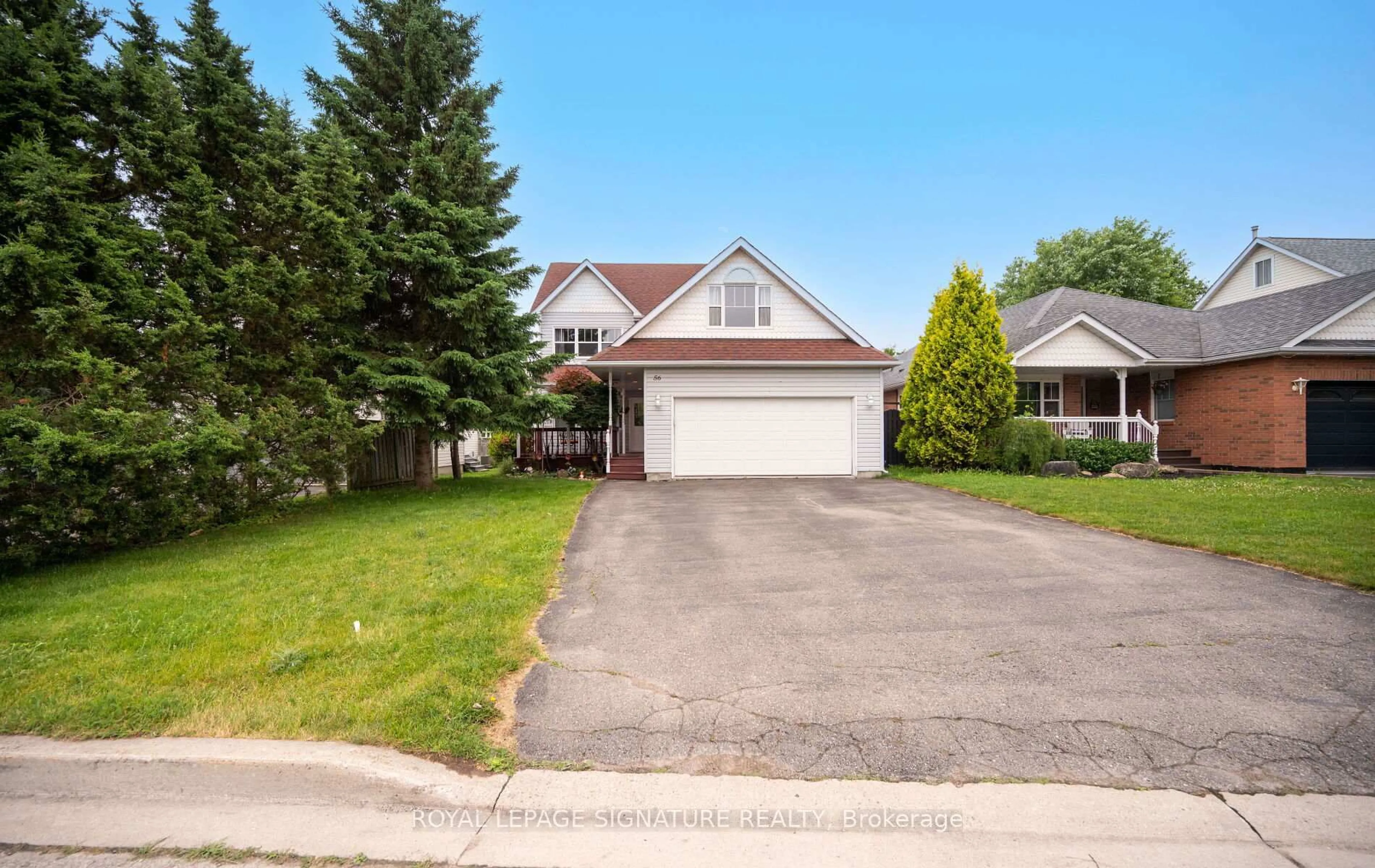 Home with vinyl exterior material, street for 56 Dairy Dr, Halton Hills Ontario L7J 2Y1