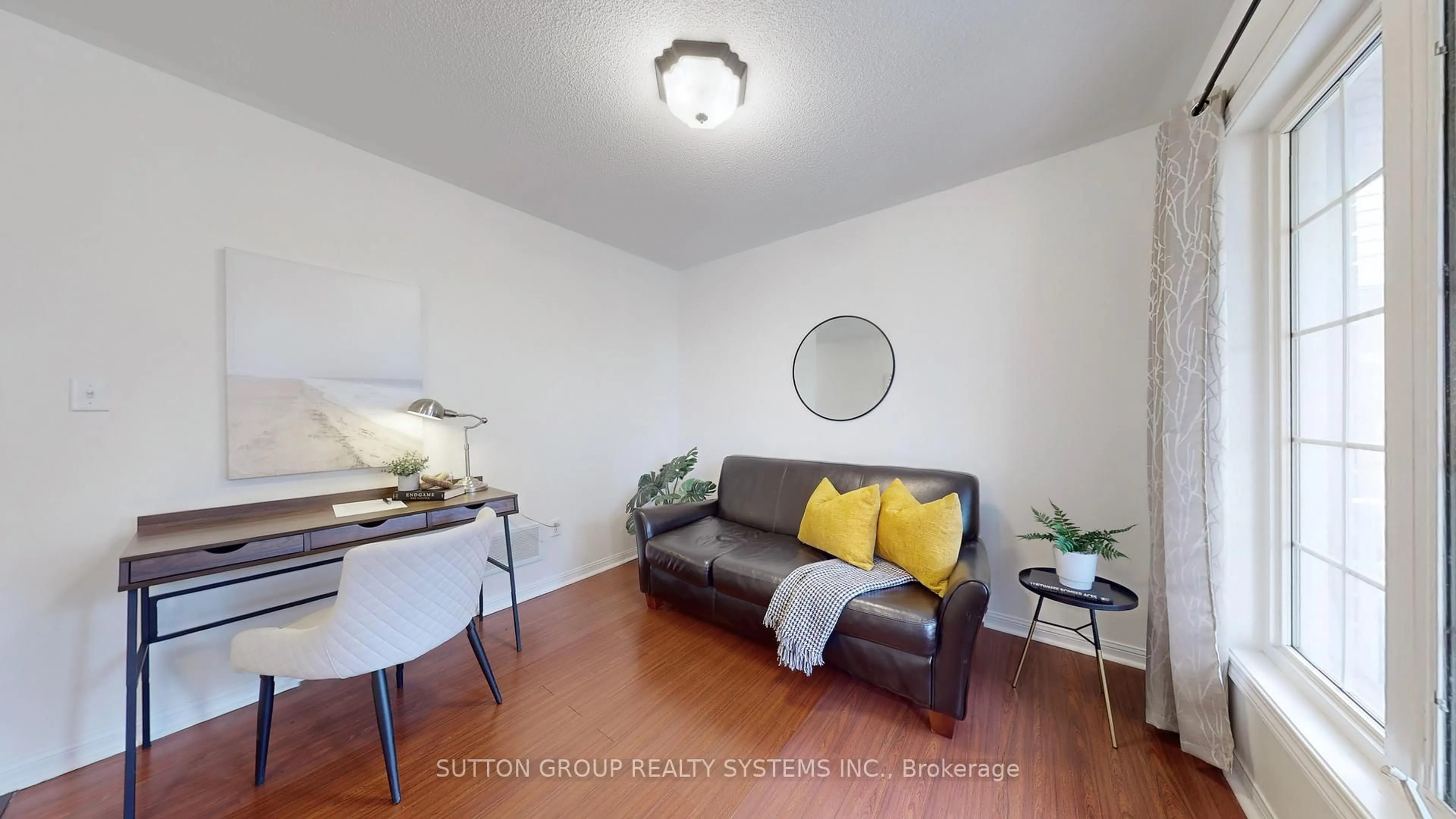 Living room with furniture, wood/laminate floor for 42 Sweetwood Circ, Brampton Ontario L7A 2R9