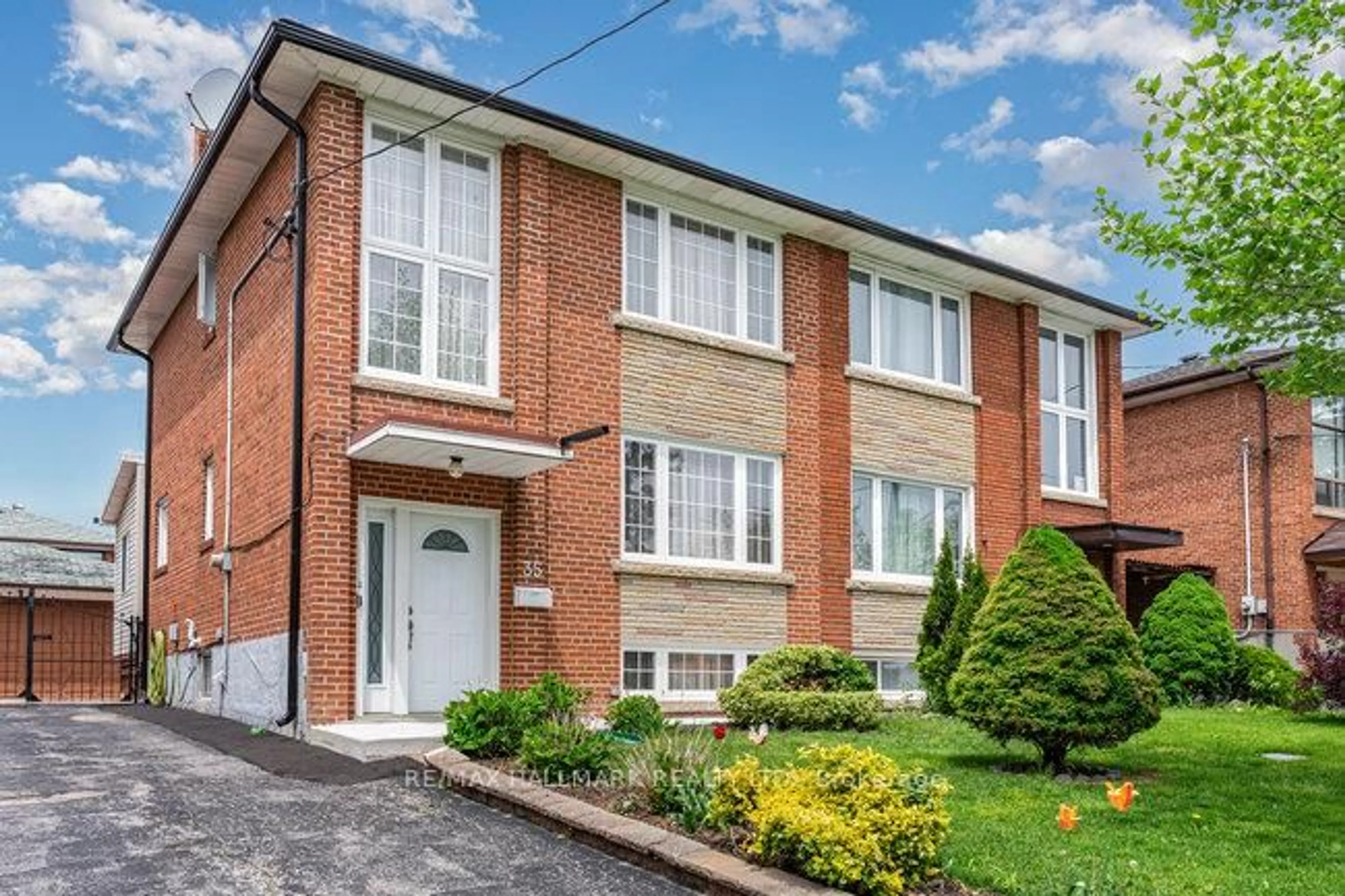 Home with brick exterior material, street for 35 Clairton Cres, Toronto Ontario M6N 2M7