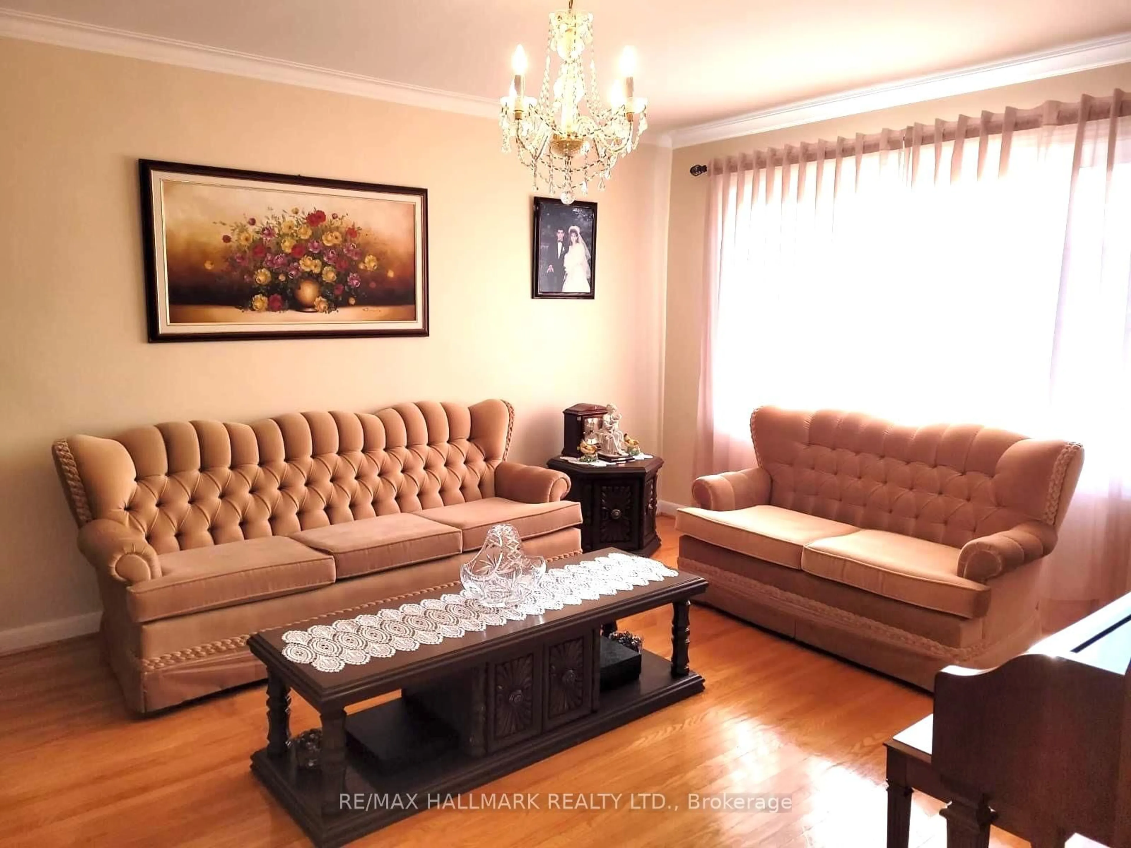 Living room with furniture, wood/laminate floor for 35 Clairton Cres, Toronto Ontario M6N 2M7