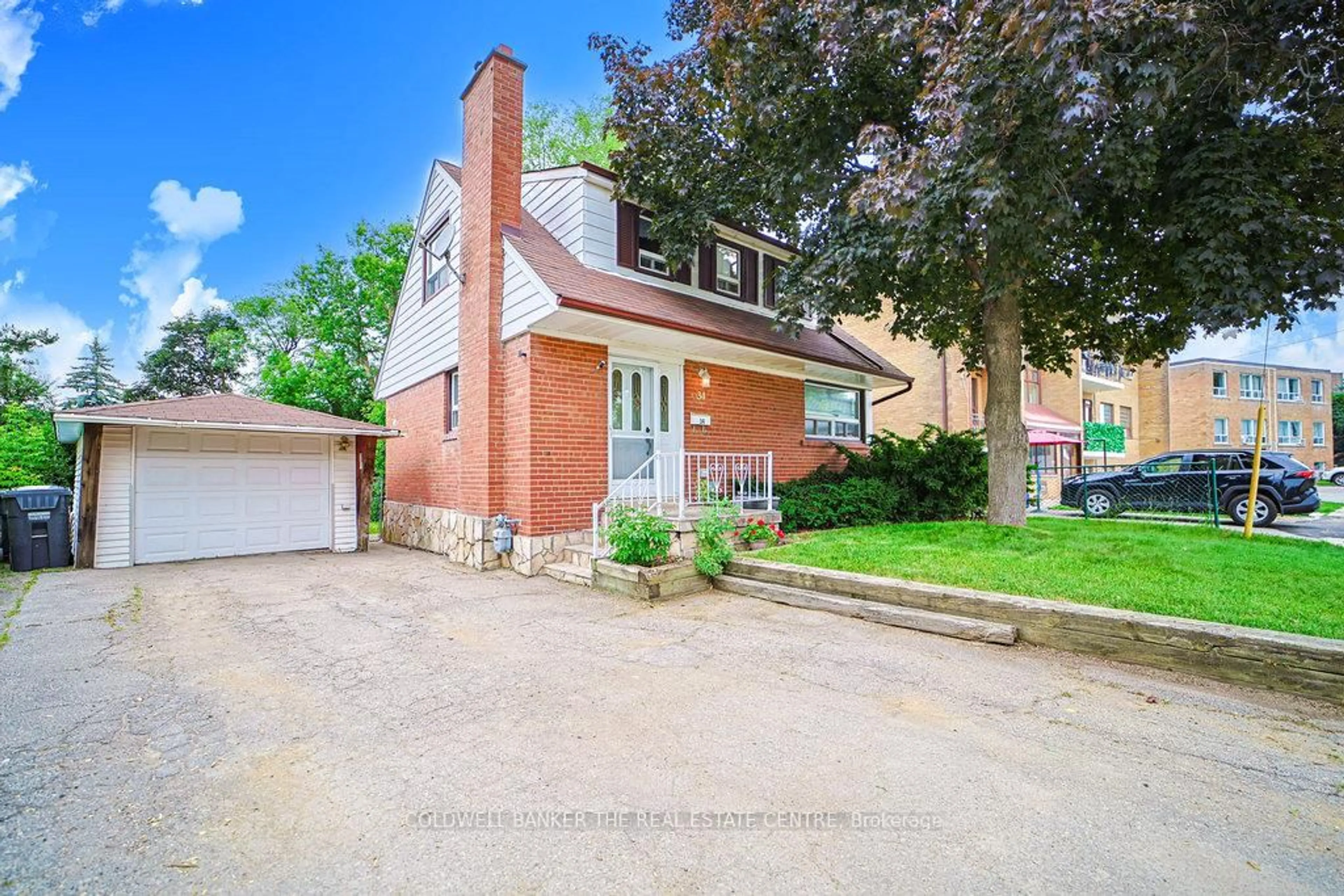 Home with brick exterior material, street for 34 Crestview Ave, Brampton Ontario L6W 2R6