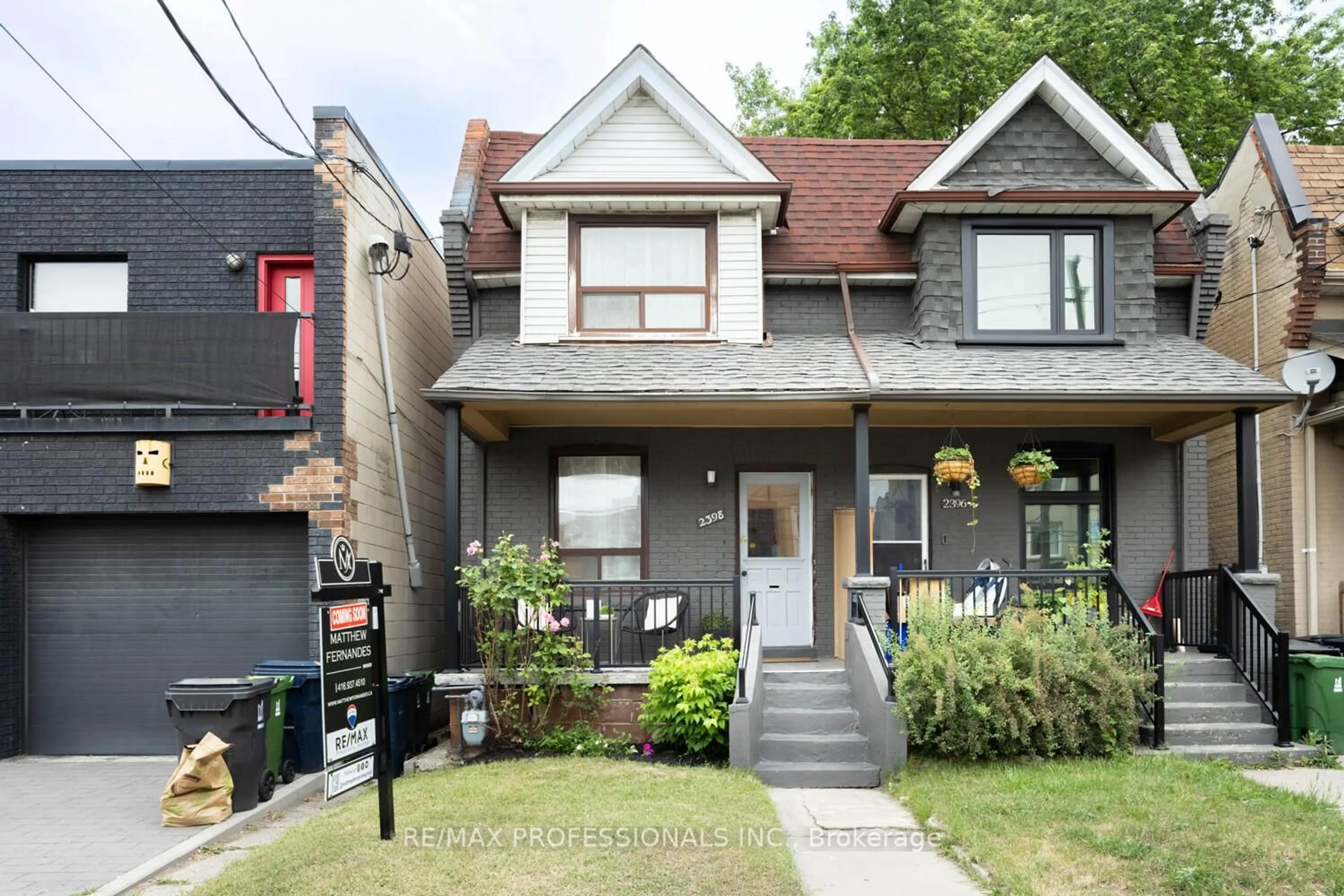 Home with brick exterior material, street for 2398 St Clair Ave, Toronto Ontario M6N 1L1