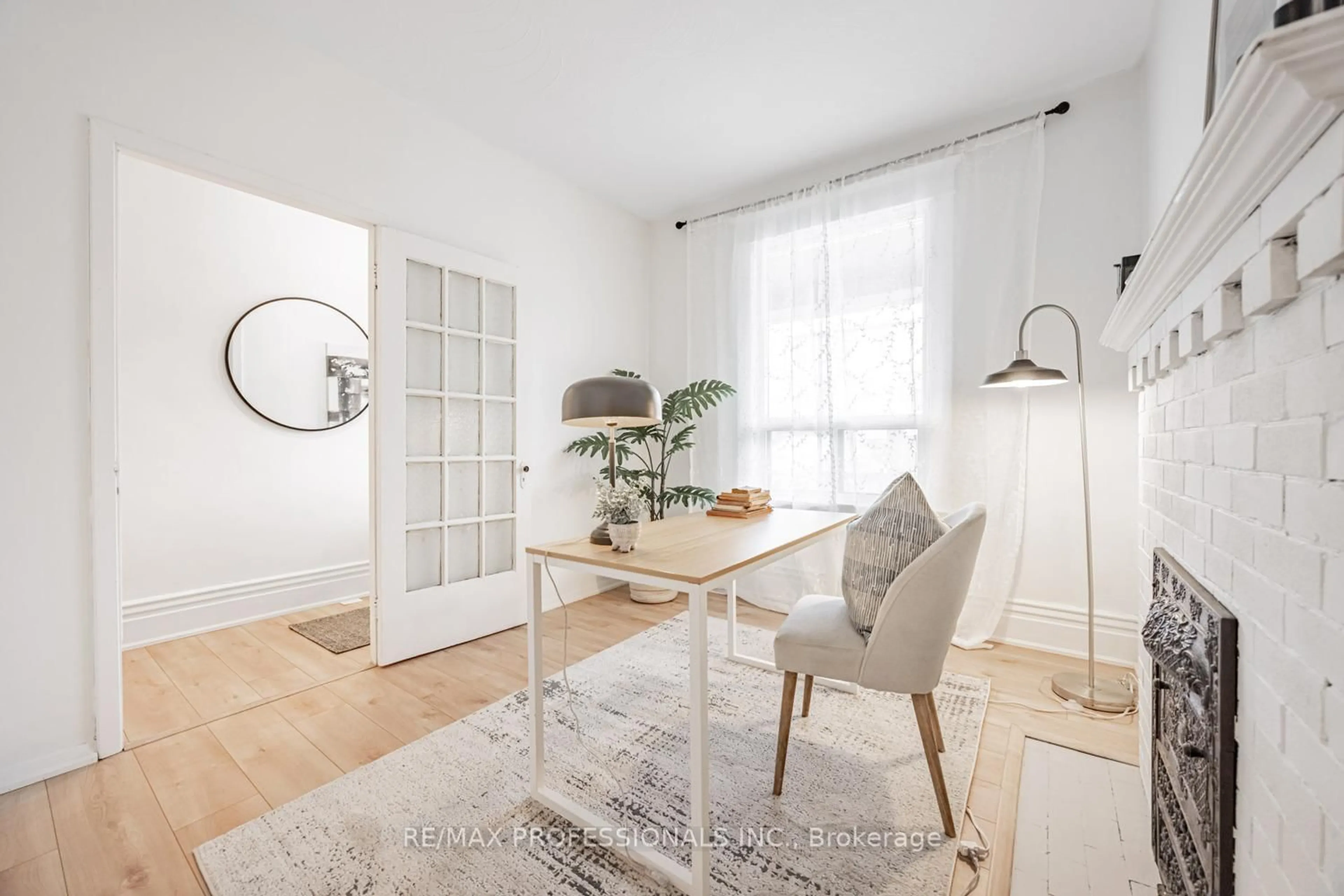 Dining room, wood/laminate floor for 2398 St Clair Ave, Toronto Ontario M6N 1L1