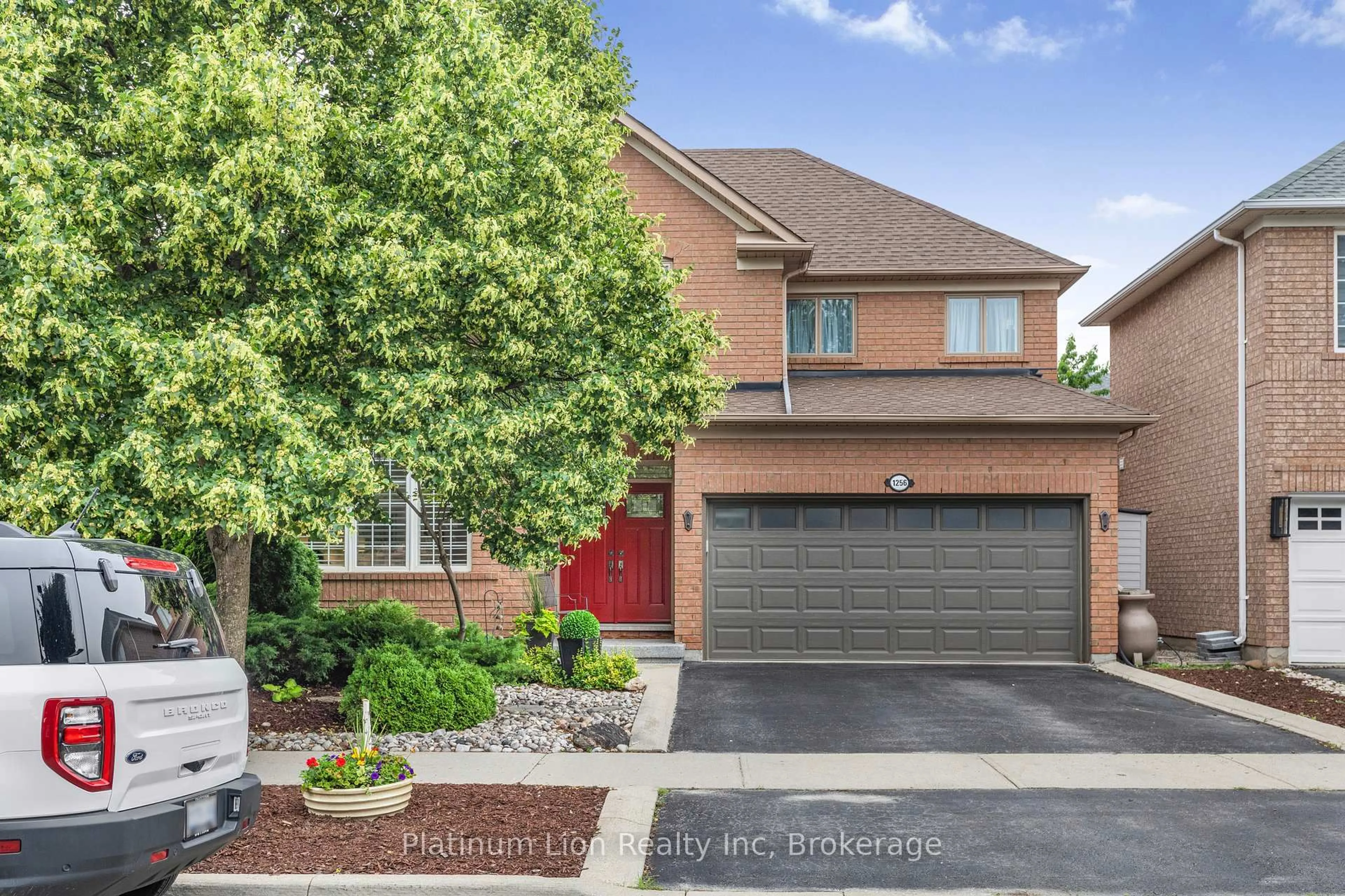 Home with brick exterior material, street for 1256 Roundwood Cres, Oakville Ontario L6M 4A3