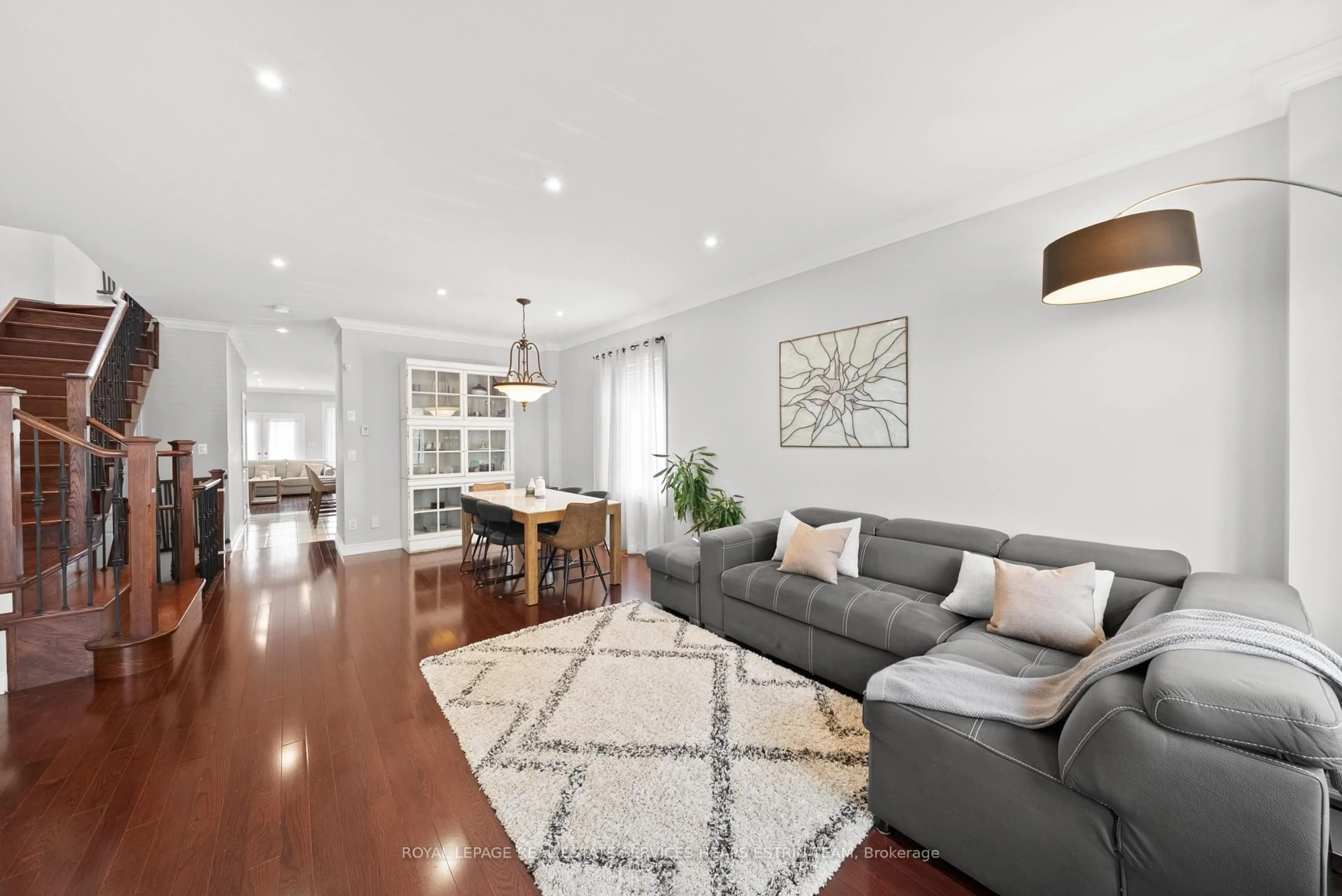 Living room with furniture, wood/laminate floor for 15 Watt Ave, Toronto Ontario M6M 3R2