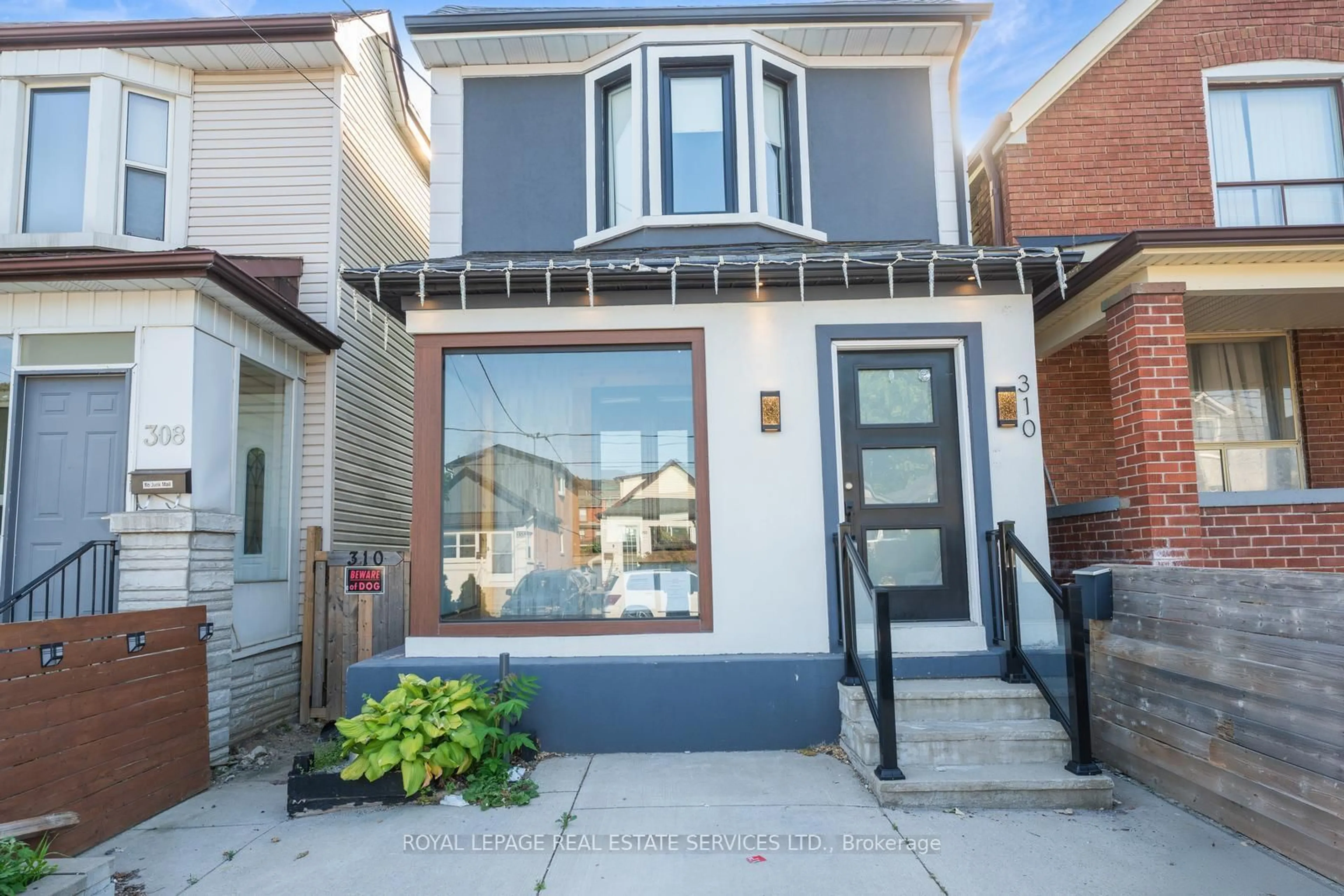 Home with brick exterior material, street for 310 Silverthorn Ave, Toronto Ontario M6N 3K6