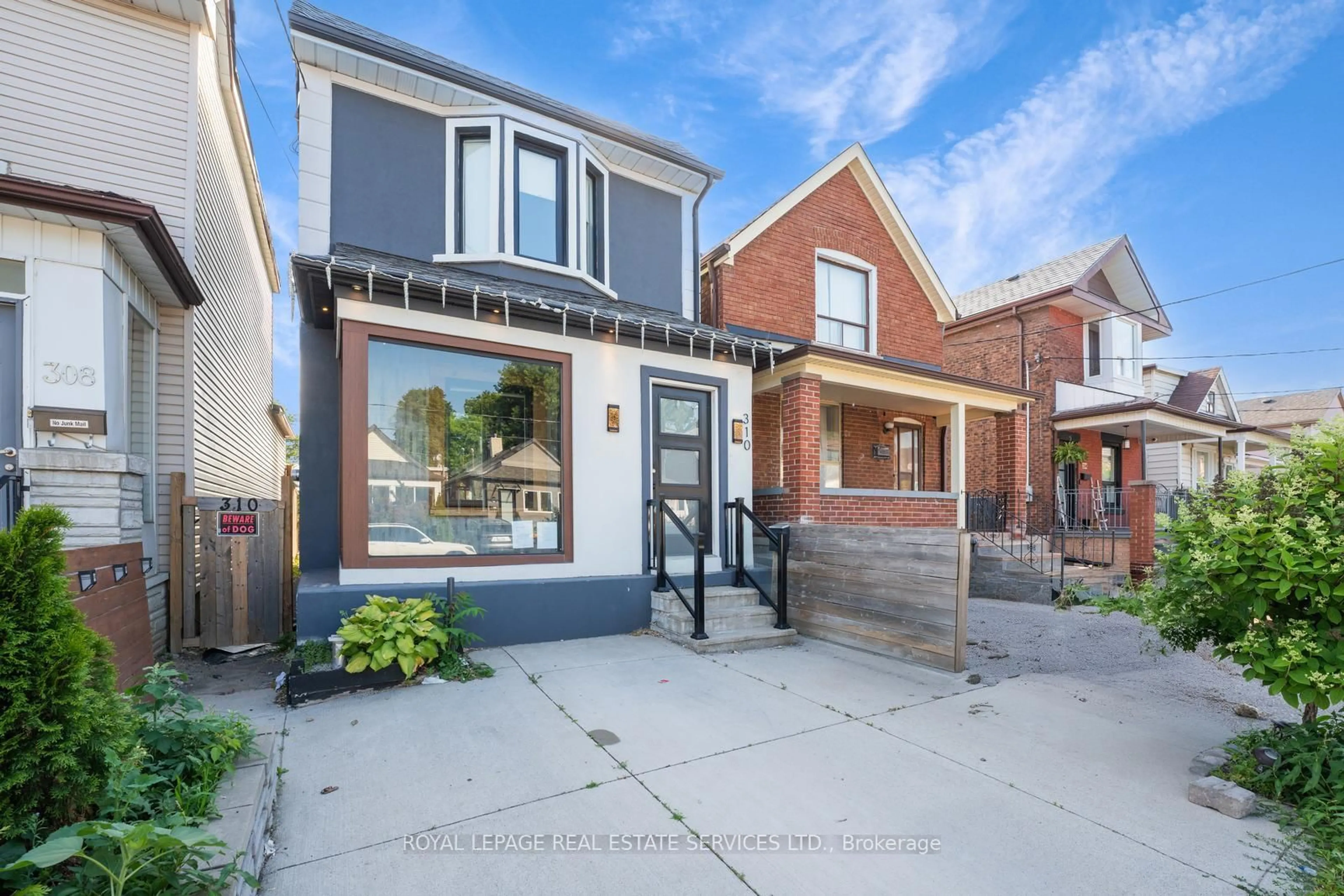 Home with brick exterior material, street for 310 Silverthorn Ave, Toronto Ontario M6N 3K6