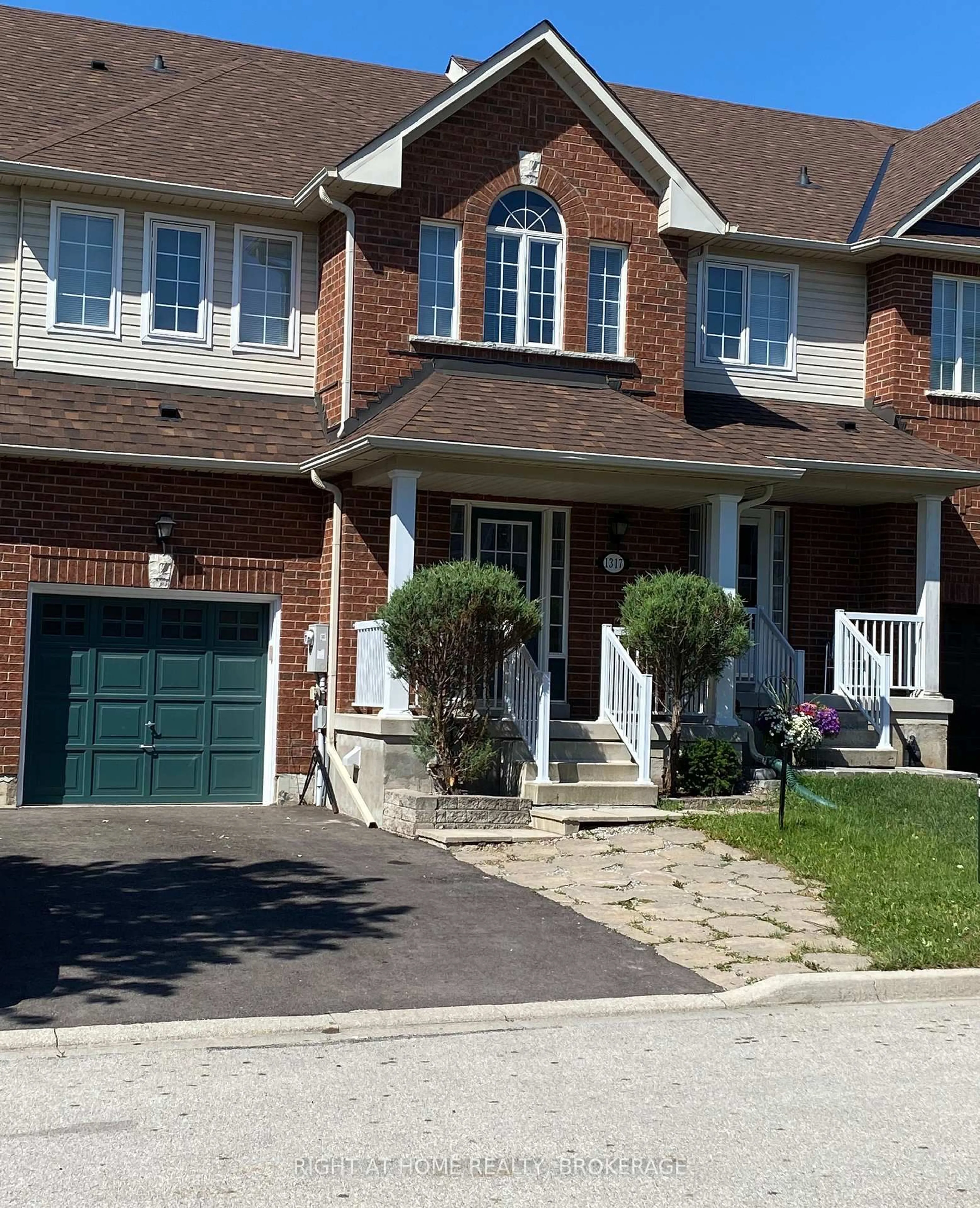 Home with brick exterior material, street for 1317 Cartmer Way, Milton Ontario L9T 6J9