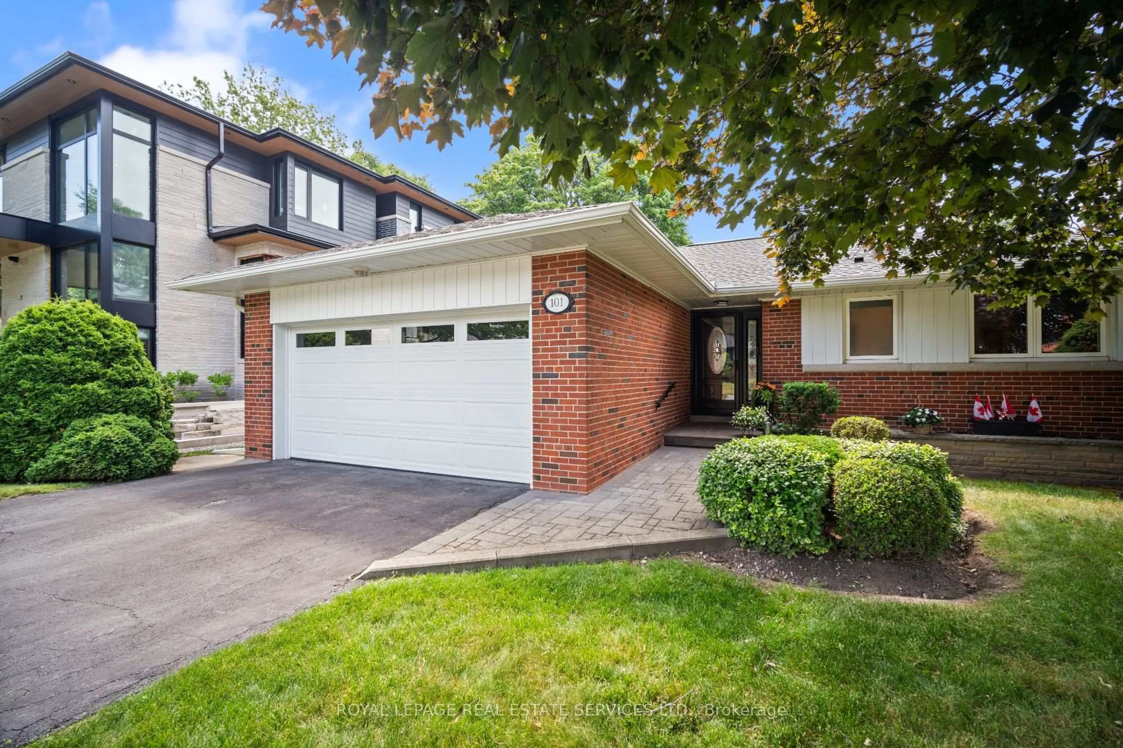 Home with brick exterior material, street for 101 Prince George Dr, Toronto Ontario M9B 2X9