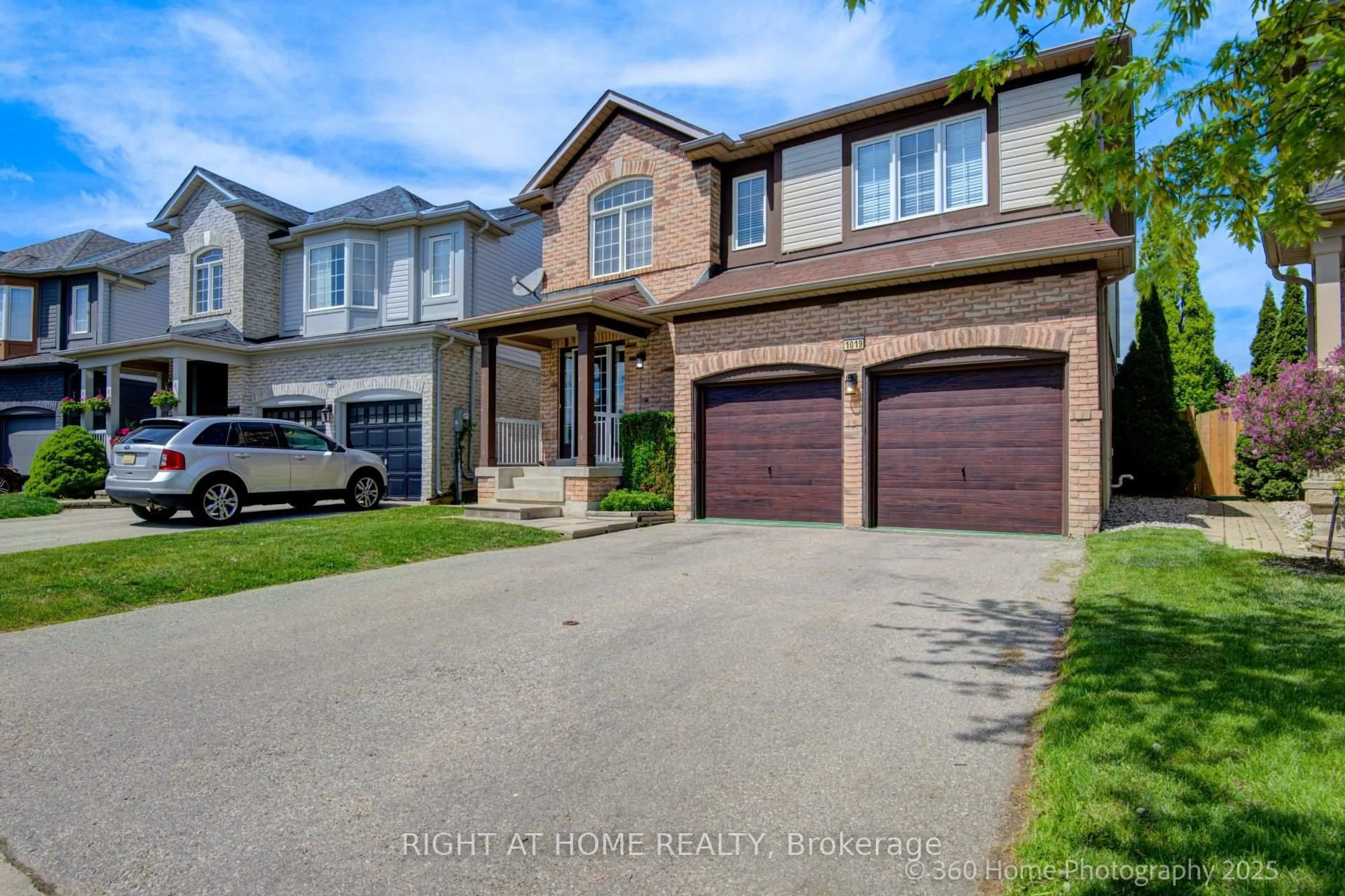 Home with brick exterior material, street for 1019 Zimmerman Cres, Milton Ontario L9T 5S6