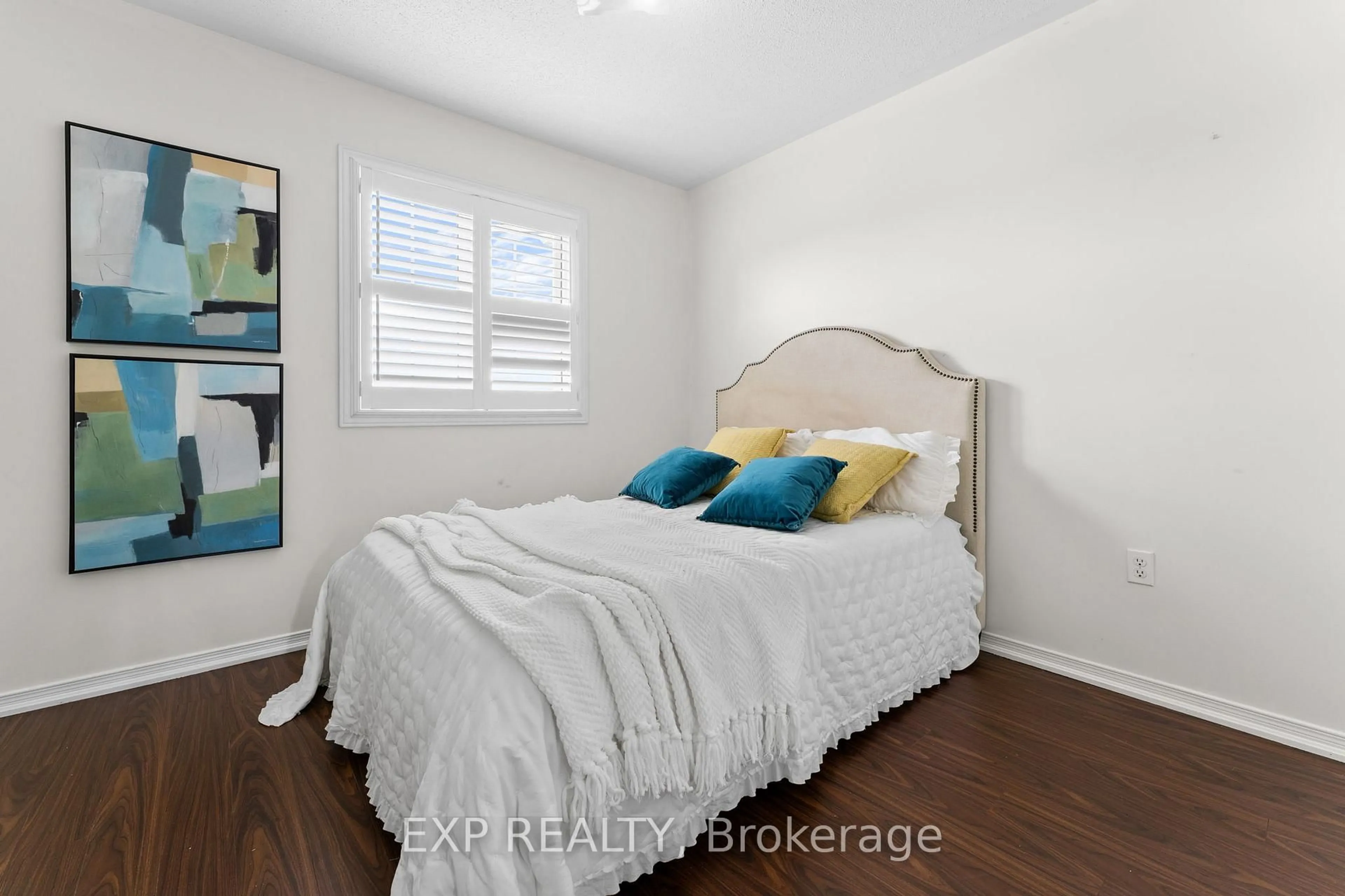 Bedroom with bed, wood/laminate floor for 13 Burnstown Circ, Brampton Ontario L6P 3M1