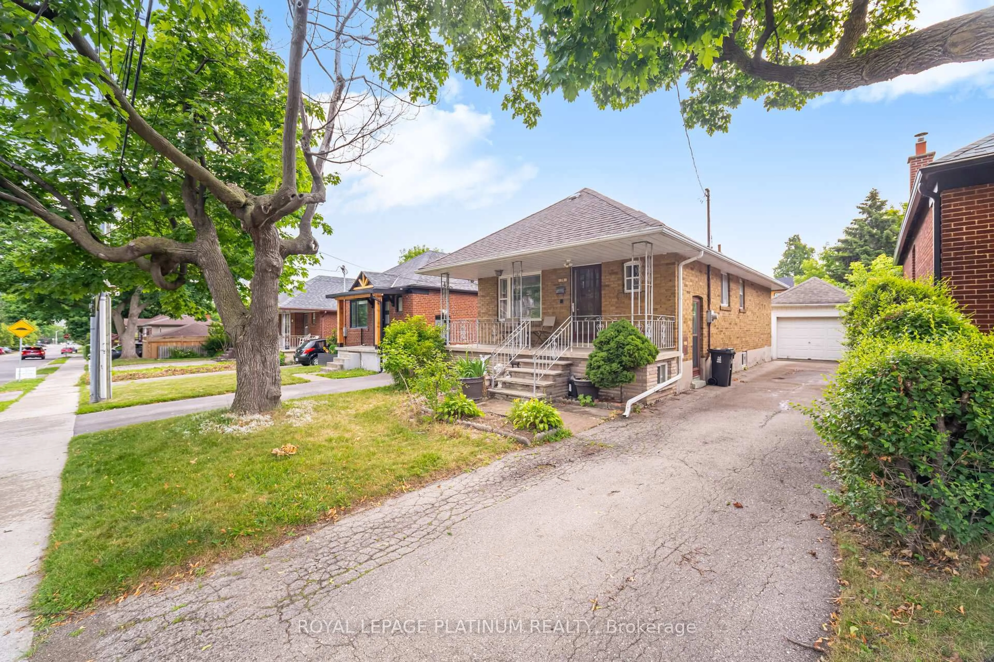 Home with brick exterior material, street for 79 Manitoba St, Toronto Ontario M8Y 1E1