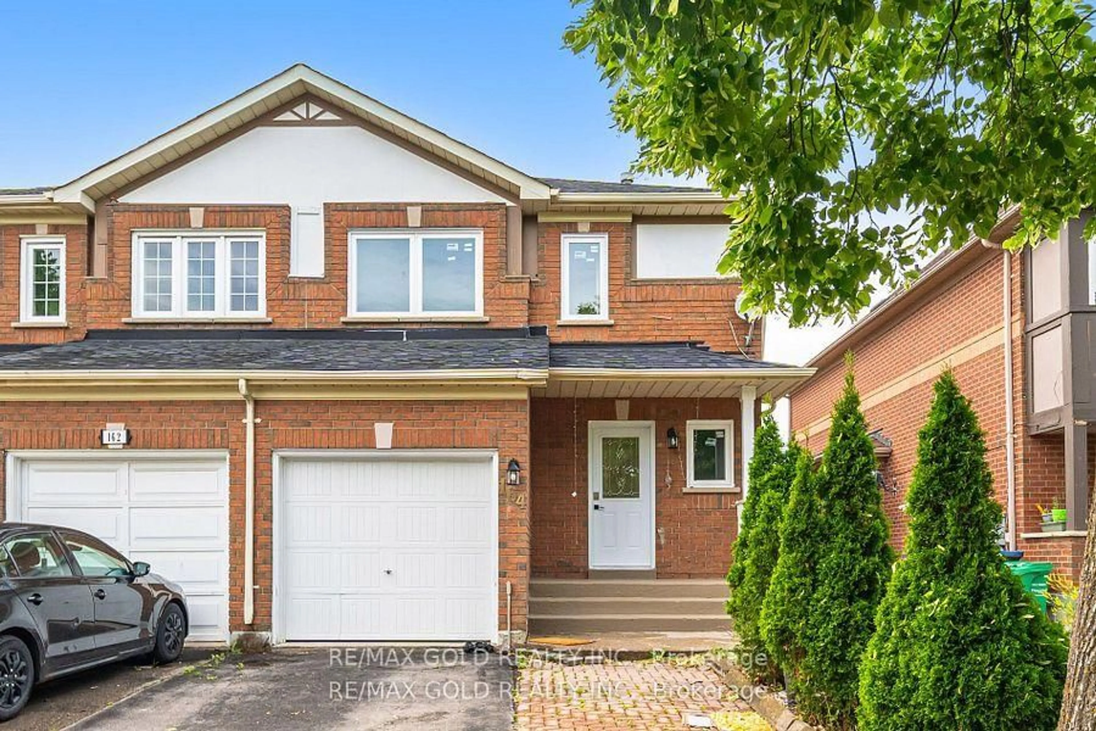 Home with brick exterior material, street for 164 Rainforest Dr, Brampton Ontario L6R 1A4
