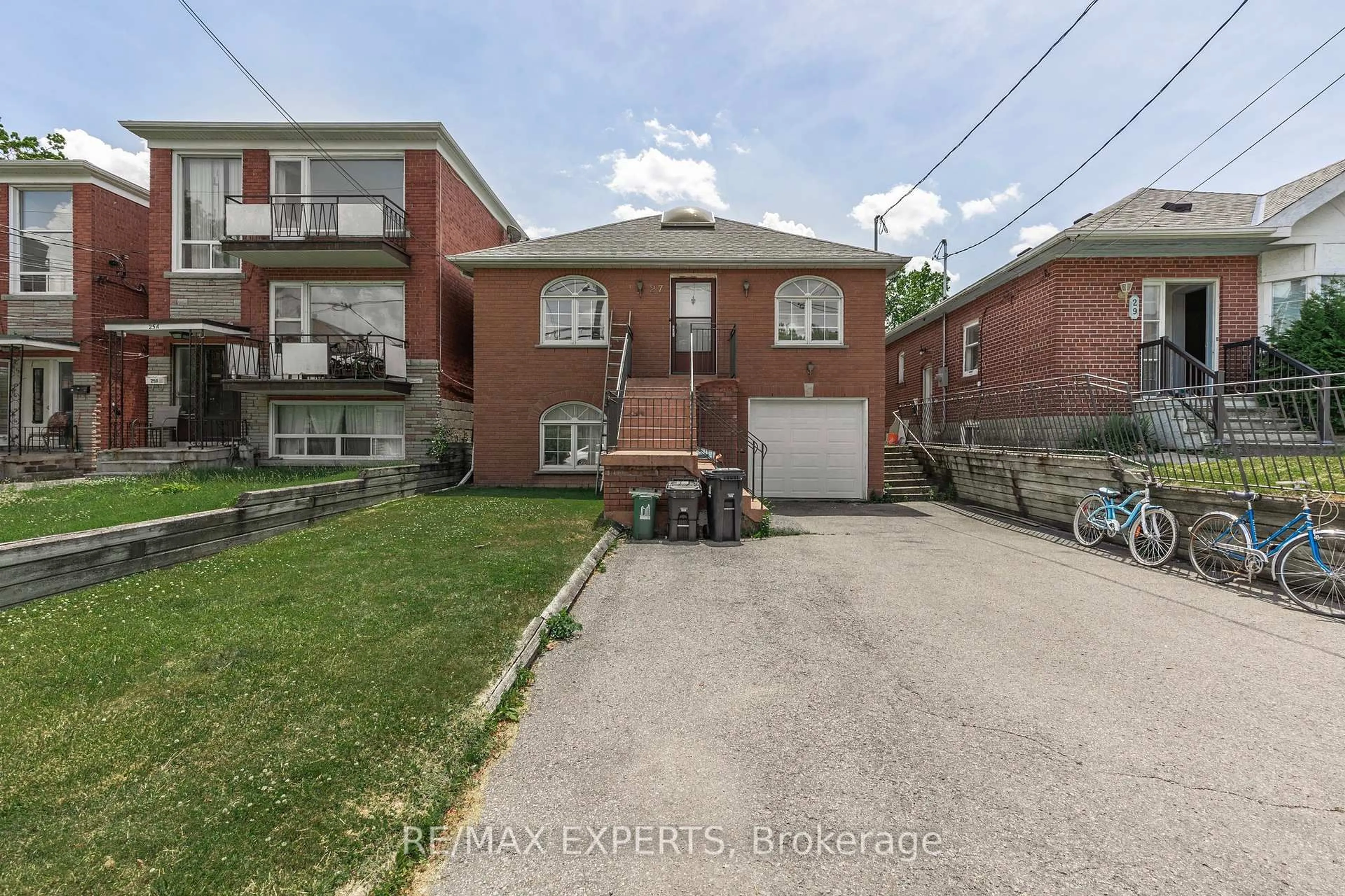 Home with brick exterior material, street for 27 Venn Cres, Toronto Ontario M6M 1S5
