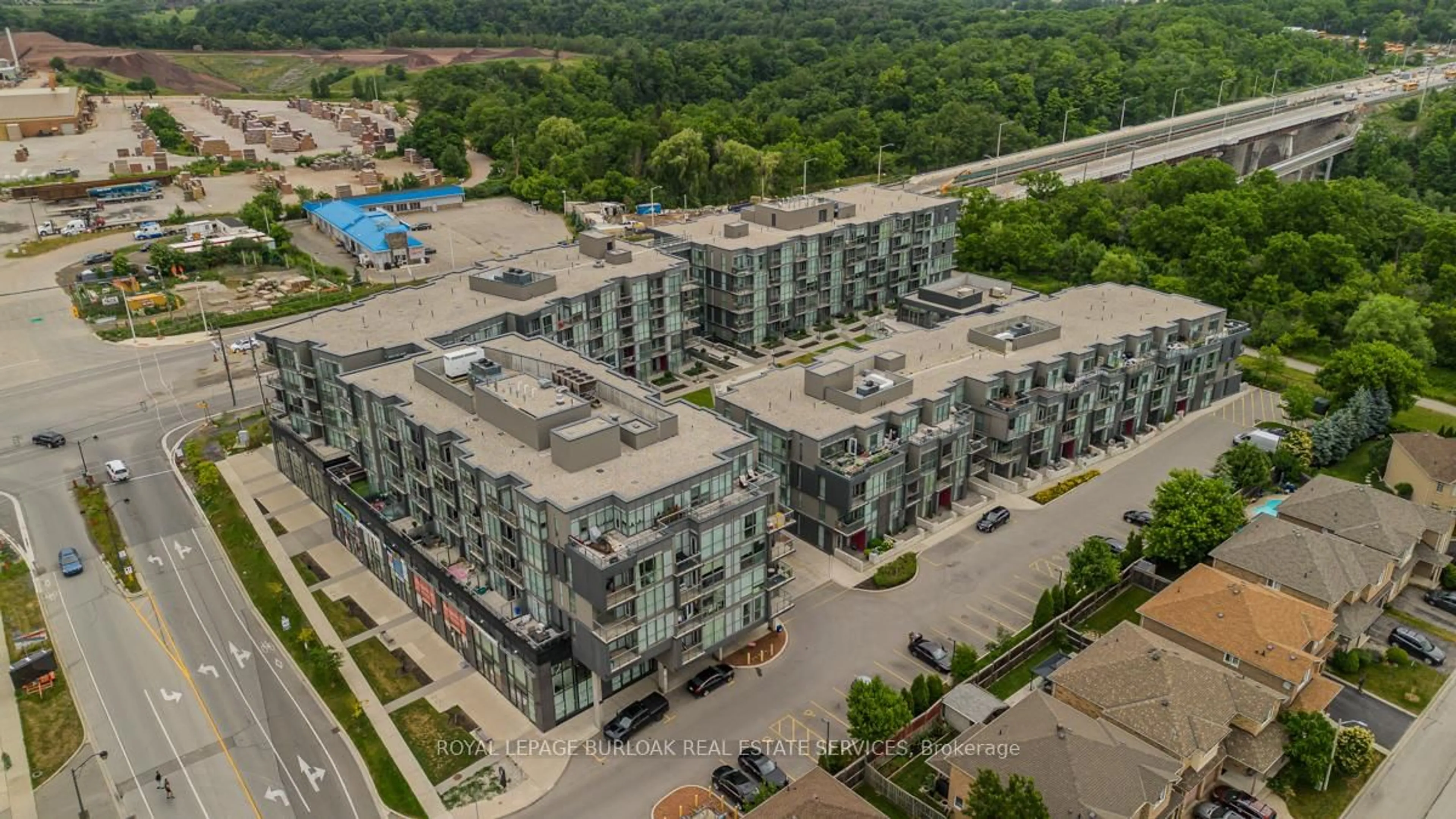 A pic from outside/outdoor area/front of a property/back of a property/a pic from drone, unknown for 5260 Dundas St #C320, Burlington Ontario L7R 0J7