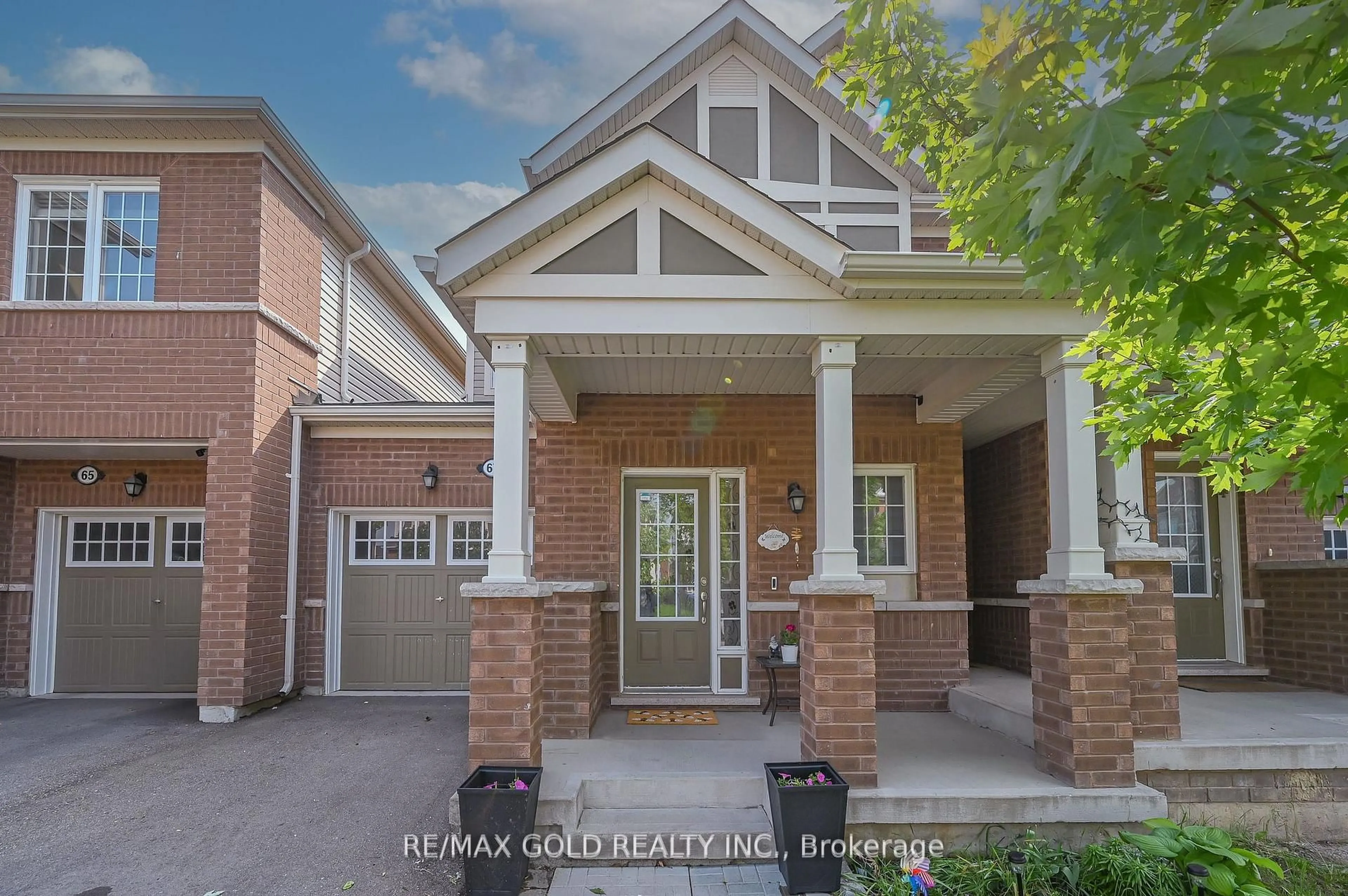 Home with brick exterior material, street for 67 Rockbrook Tr, Brampton Ontario L7A 4H9
