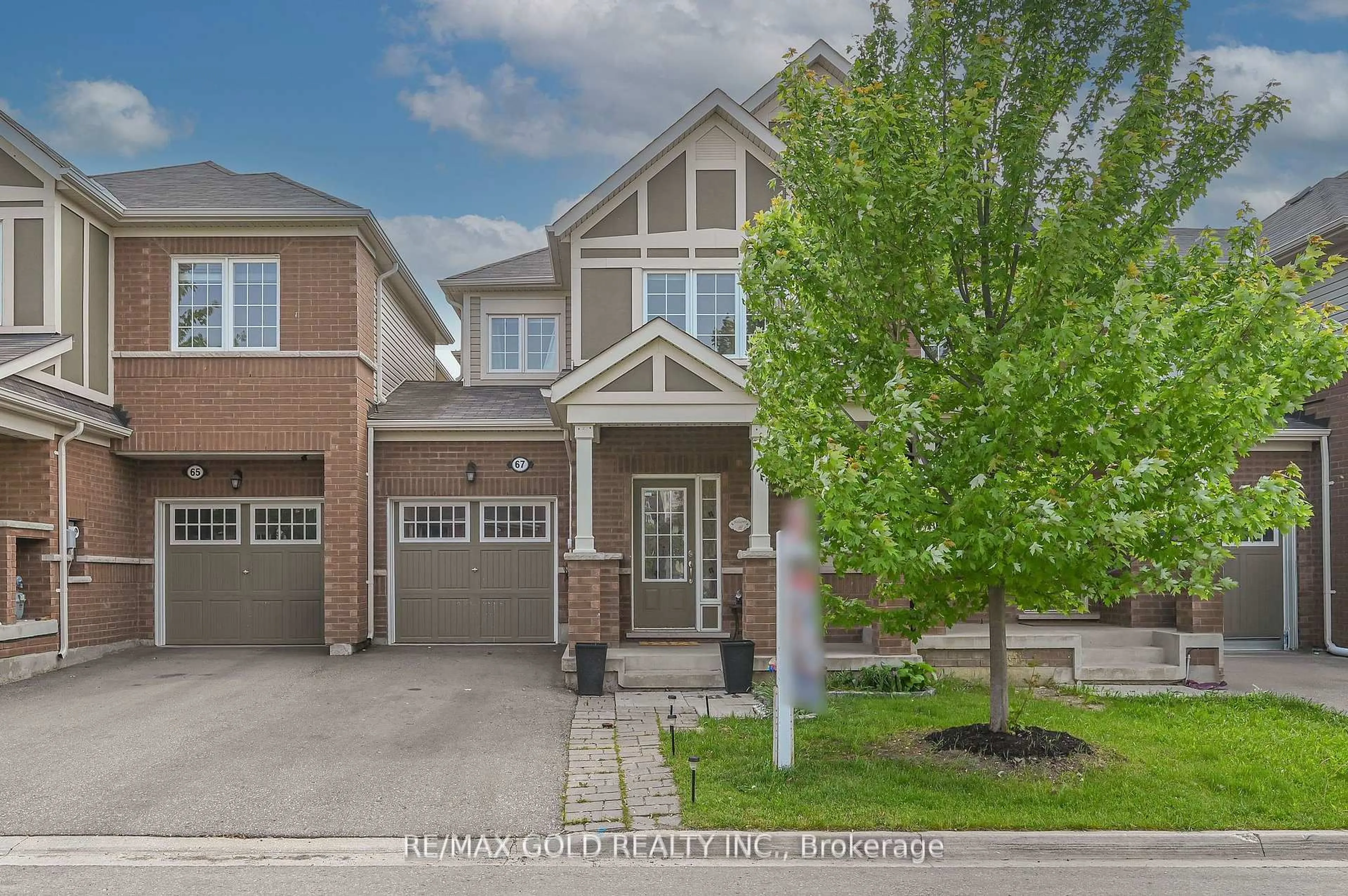Home with brick exterior material, street for 67 Rockbrook Tr, Brampton Ontario L7A 4H9