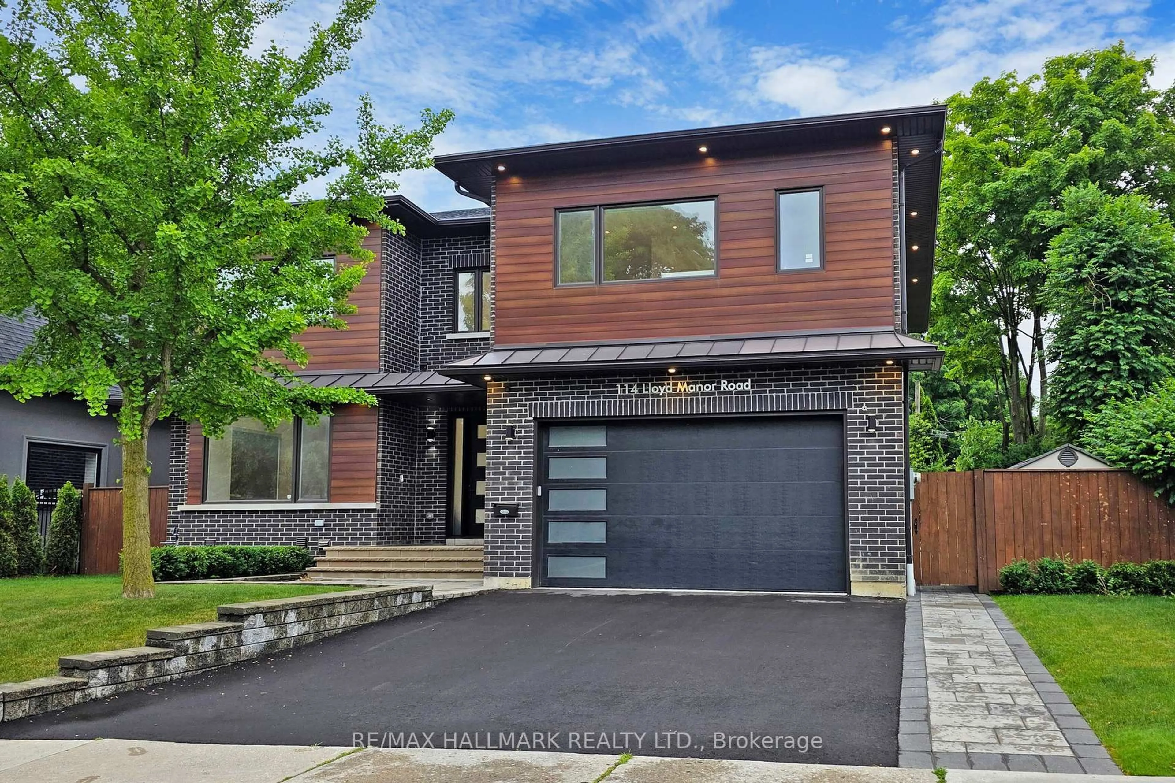 Home with brick exterior material, street for 114 Lloyd Manor Rd, Toronto Ontario M9B 5J9