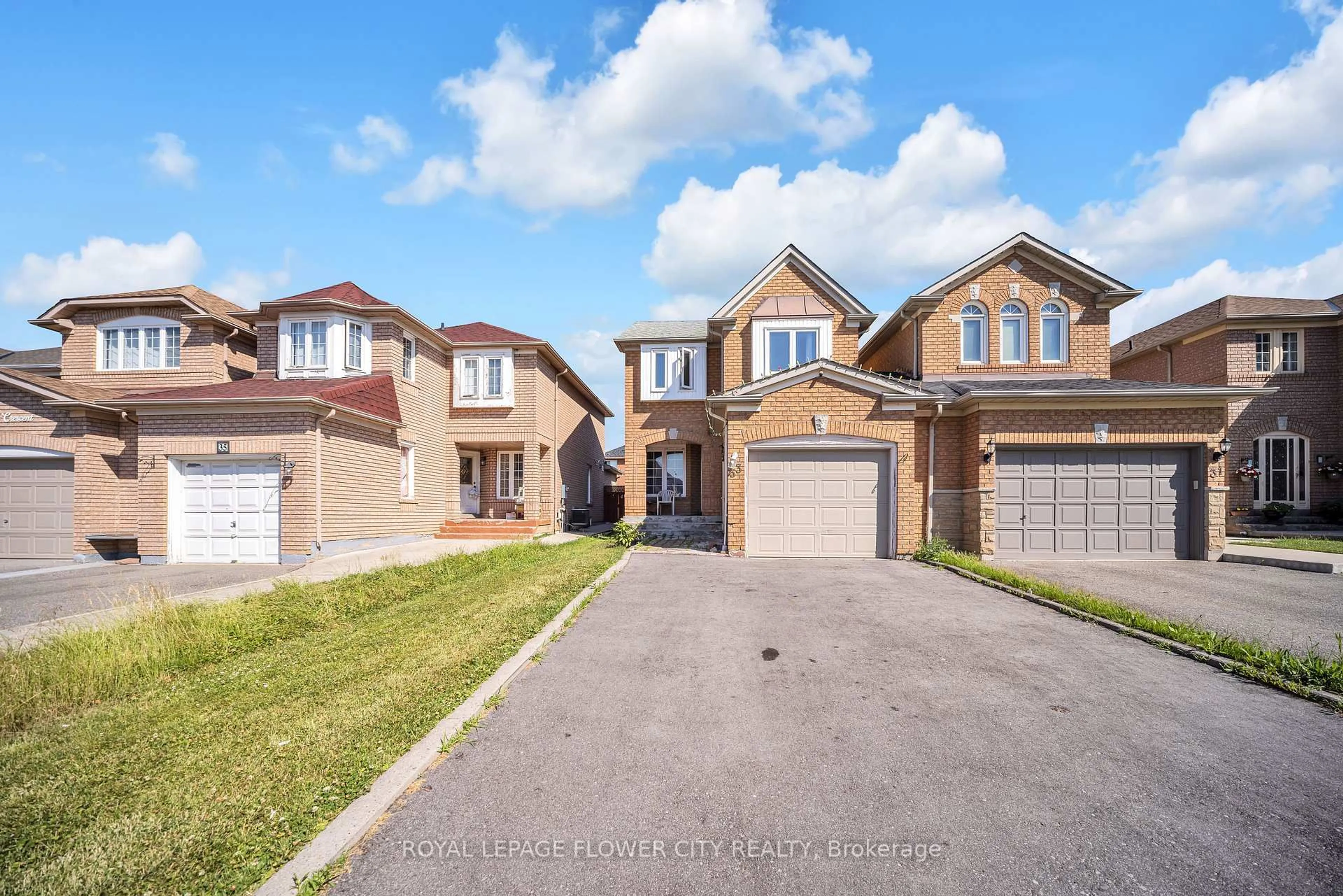 Home with brick exterior material, street for 33 Fiddleneck Cres, Brampton Ontario L6R 1R2
