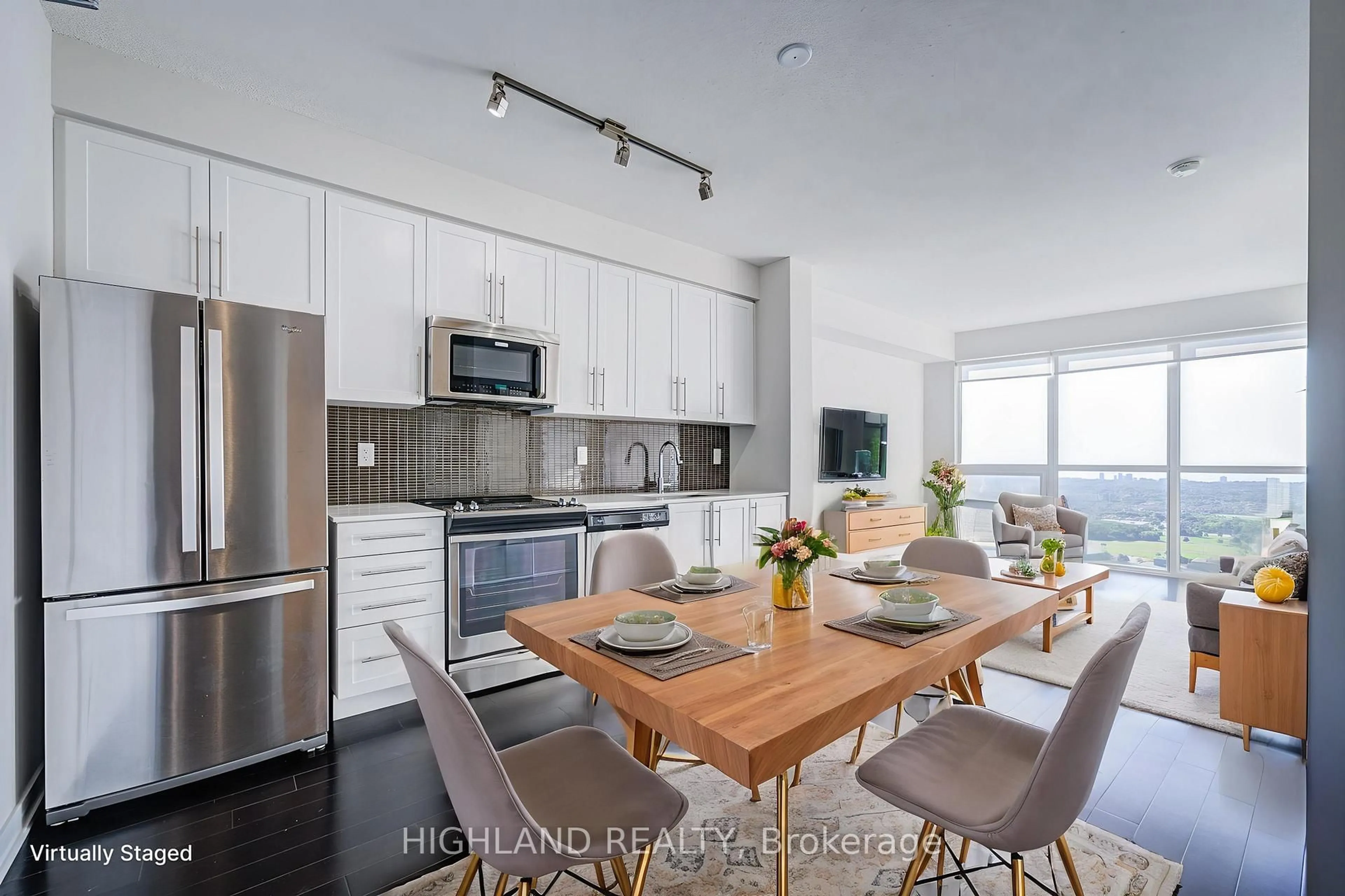 Open concept kitchen, wood/laminate floor for 510 Curran Pl #3510, Mississauga Ontario L5B 0G4