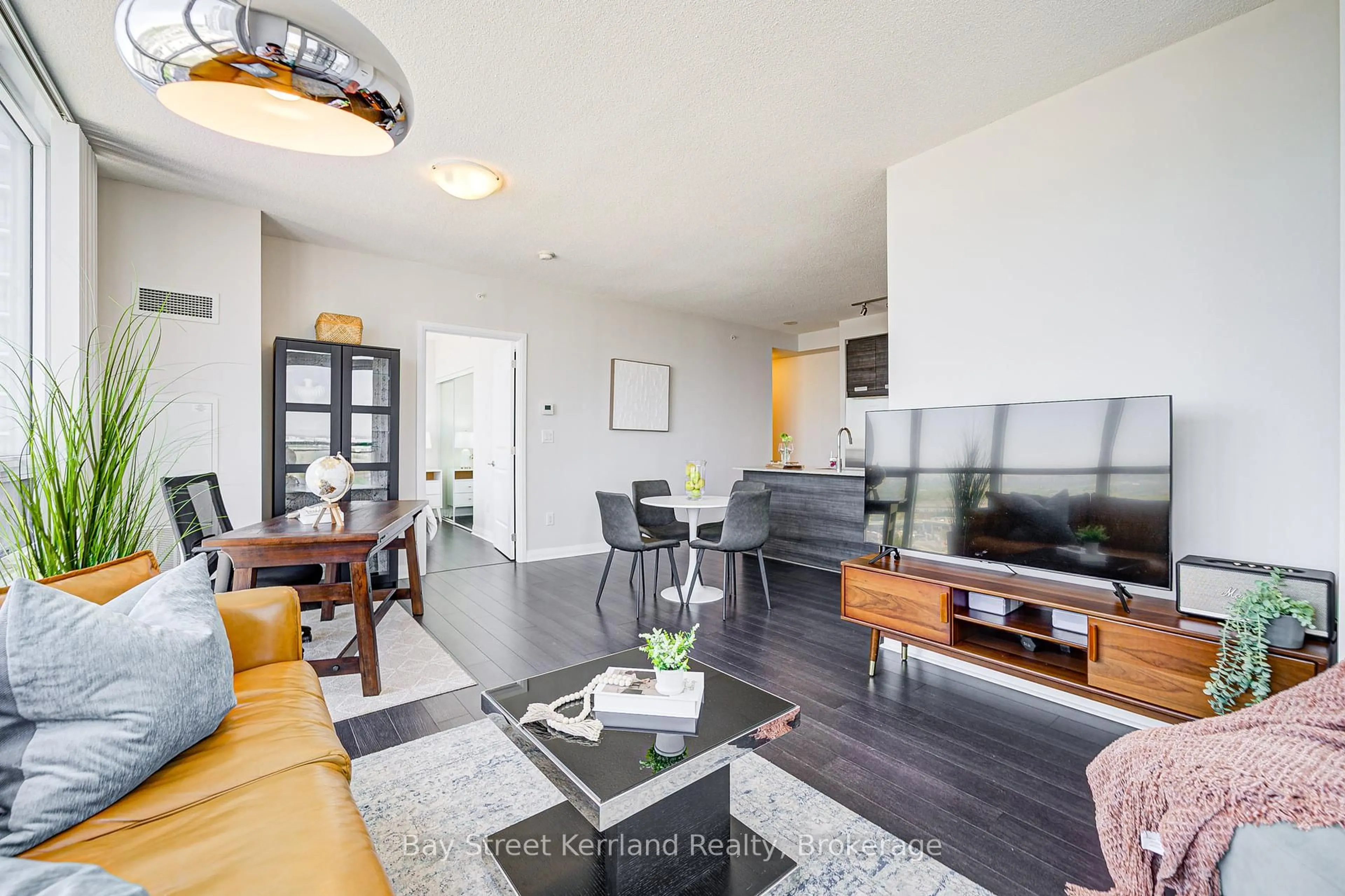 Living room with furniture, unknown for 5025 Four Springs Ave #1502, Mississauga Ontario L5R 0G5