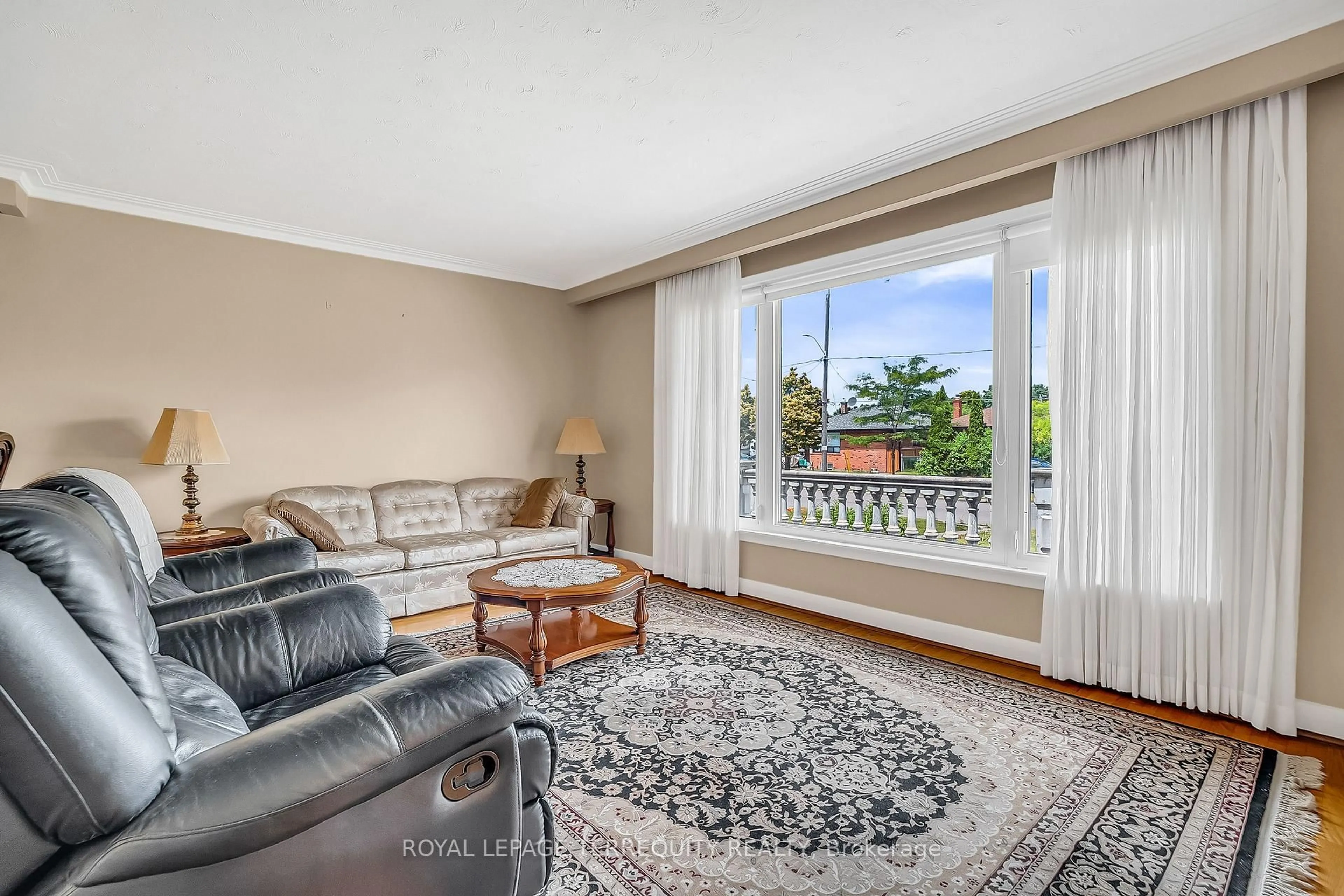 Living room with furniture, unknown for 84 Blaydon Ave, Toronto Ontario M3M 2E5