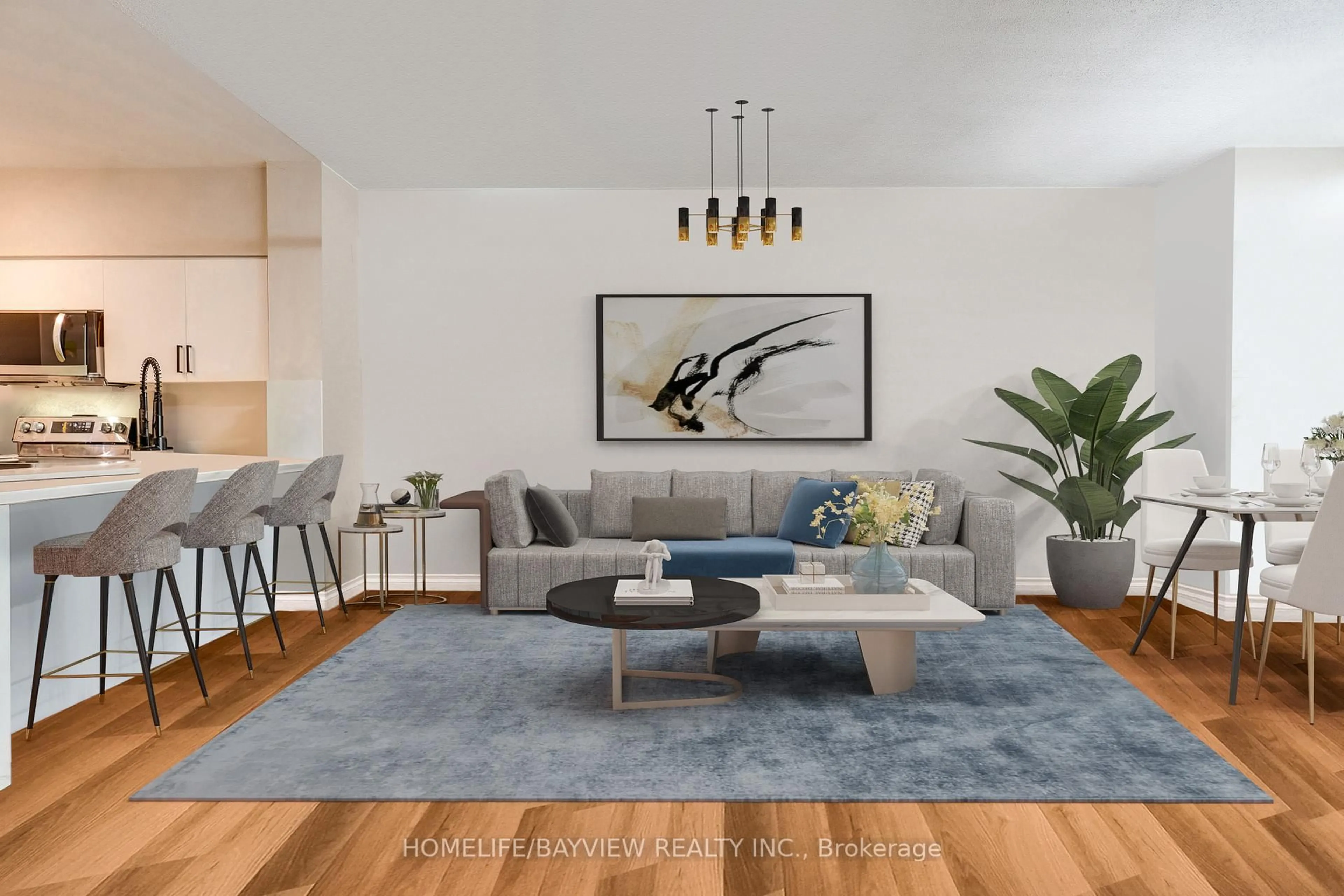 Living room with furniture, wood/laminate floor for 185 Legion Rd #315, Toronto Ontario M8Y 0A1