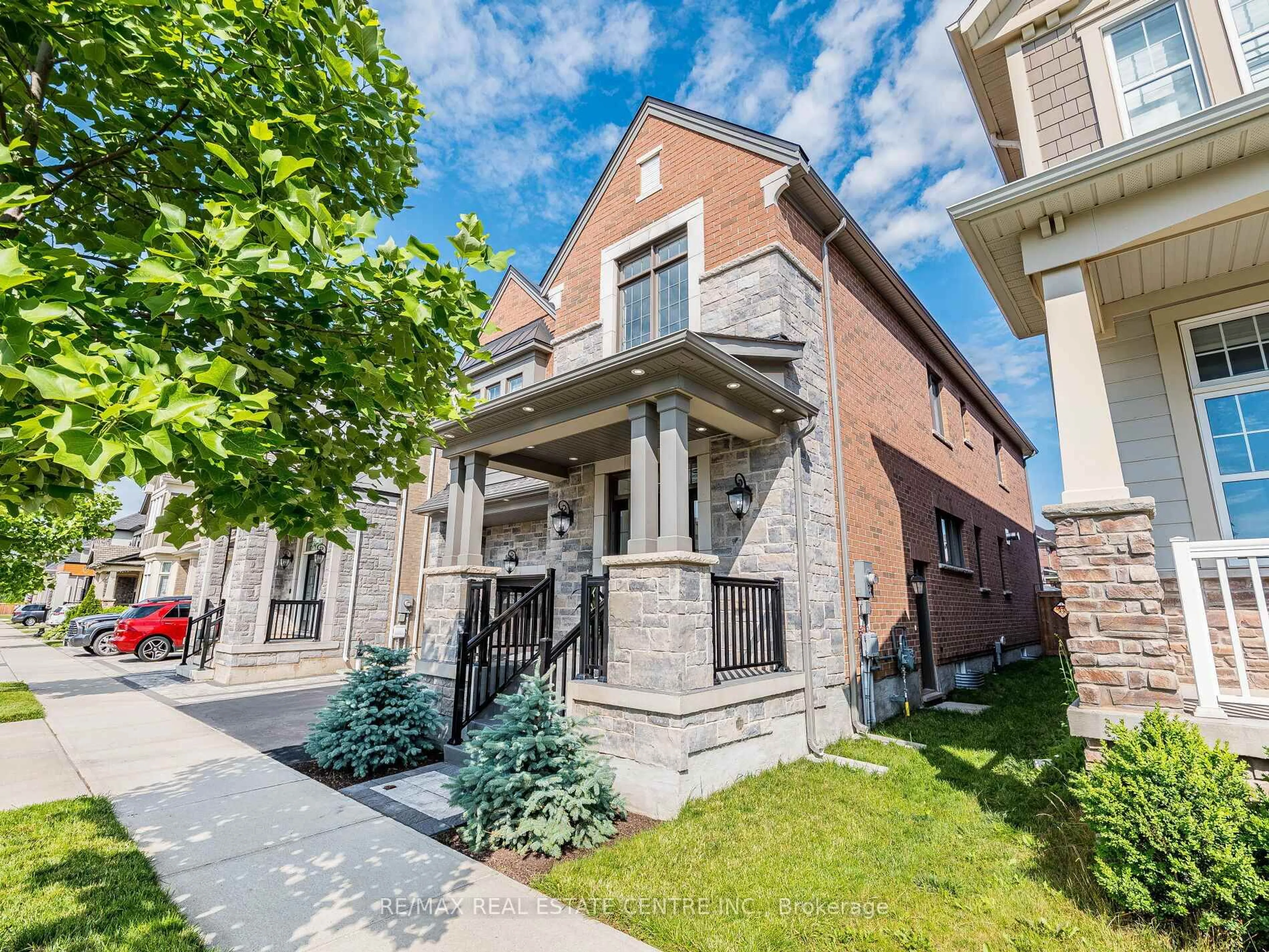 Home with brick exterior material, street for 323 Harold Dent Tr, Oakville Ontario L6M 1R3