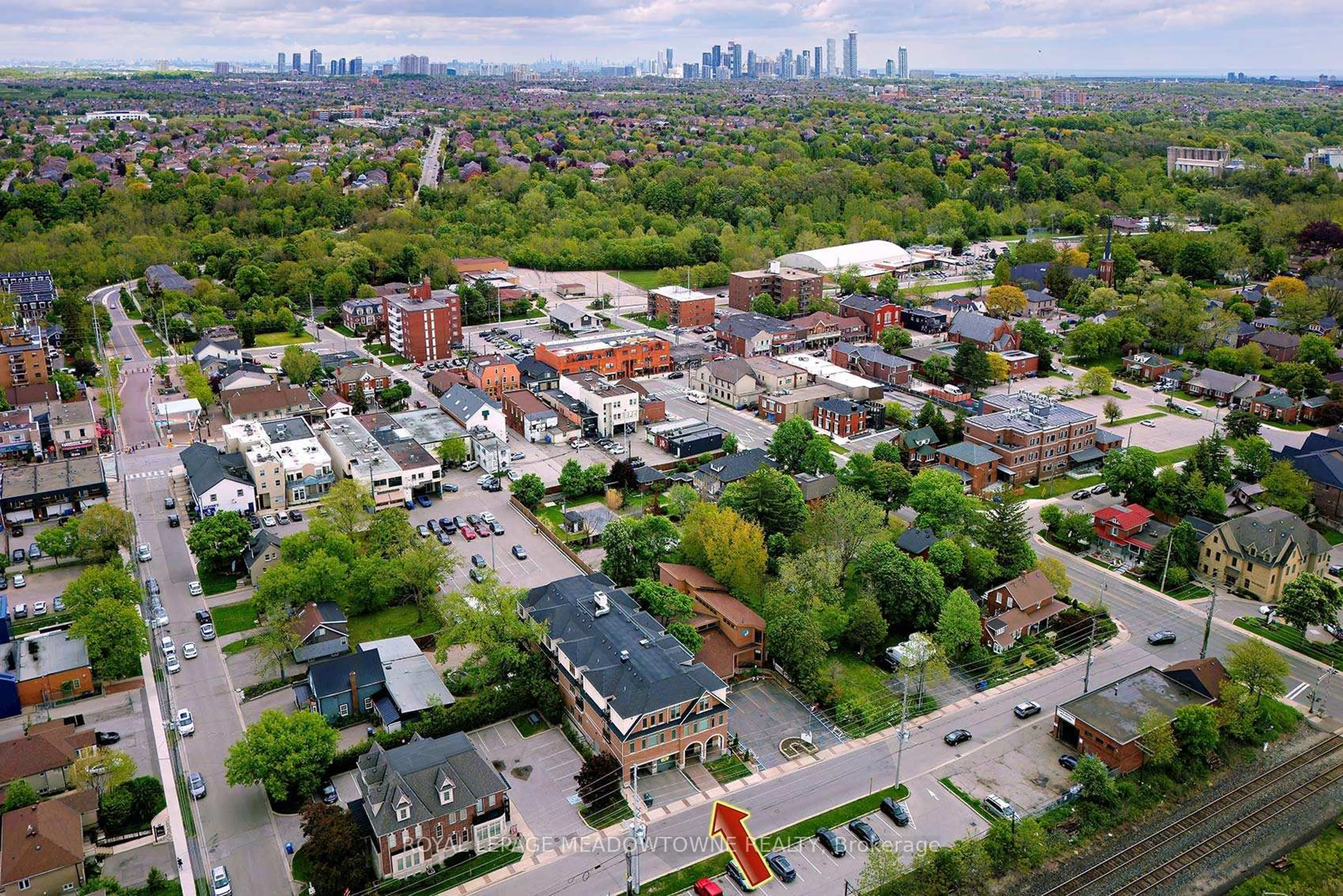 A pic from outside/outdoor area/front of a property/back of a property/a pic from drone, city buildings view from balcony for 215 Broadway St #207, Mississauga Ontario L5M 1J1