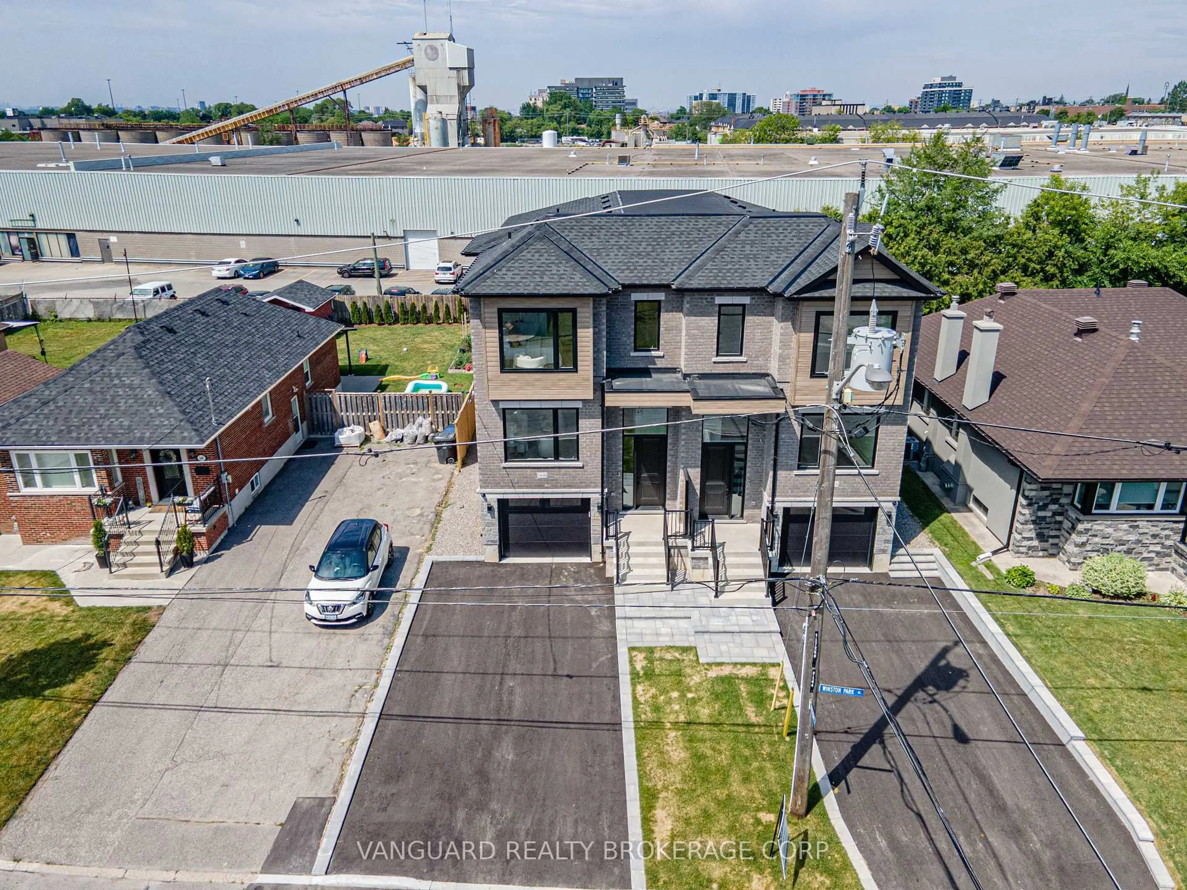A pic from outside/outdoor area/front of a property/back of a property/a pic from drone, street for 144 Winston Park Blvd #B, Toronto Ontario M3K 1C5