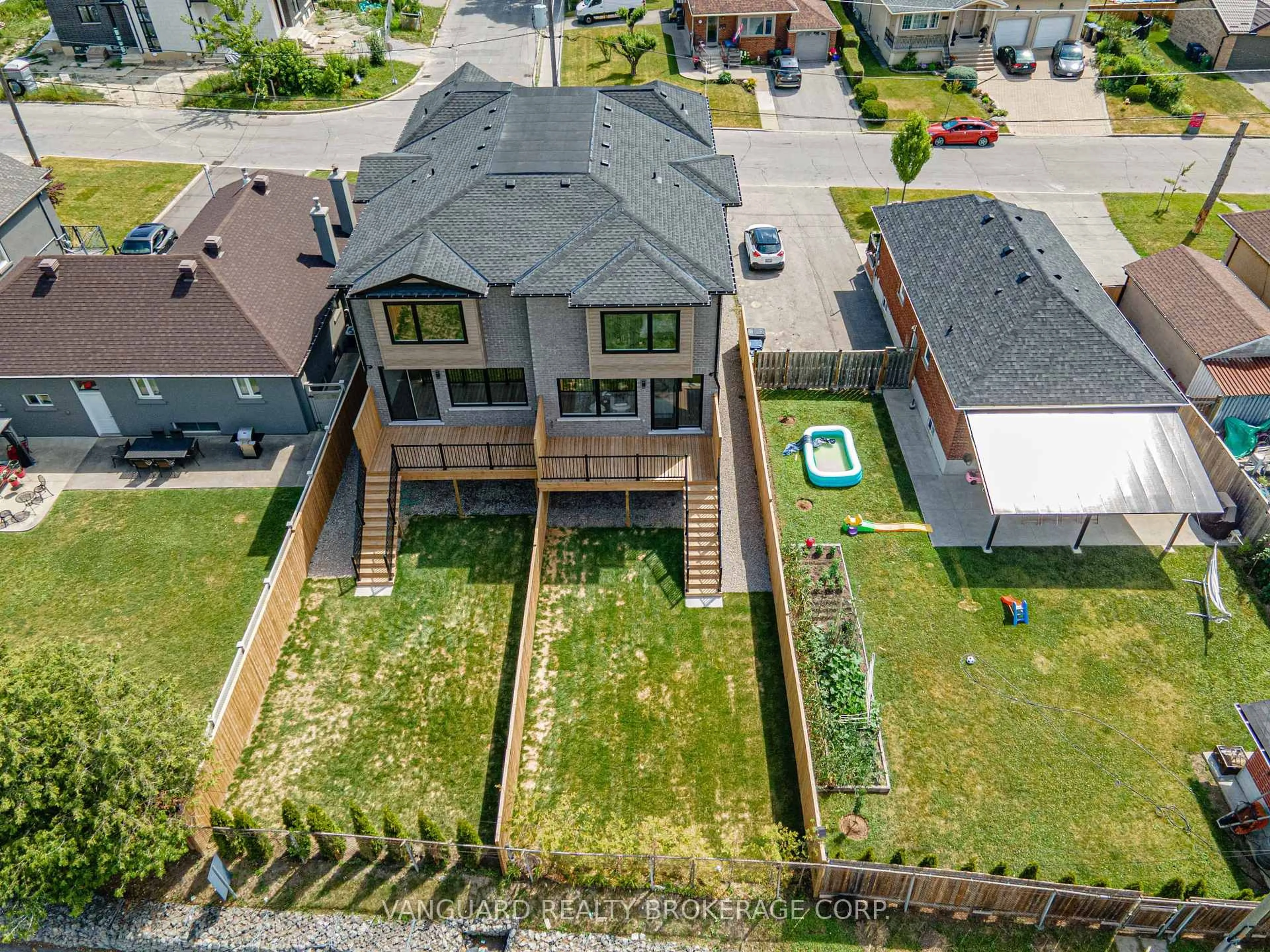A pic from outside/outdoor area/front of a property/back of a property/a pic from drone, street for 144 Winston Park Blvd #B, Toronto Ontario M3K 1C5