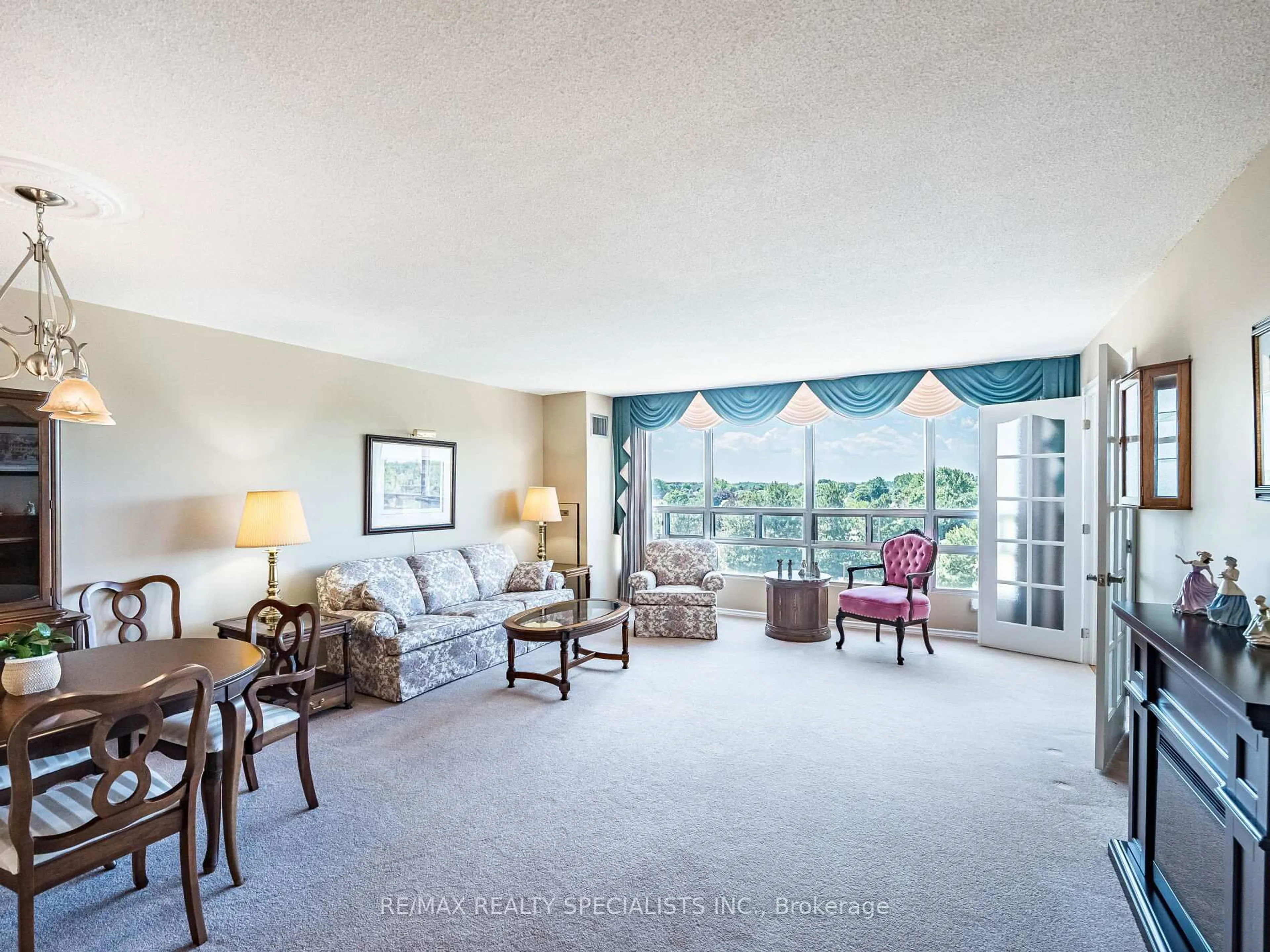 Living room with furniture, unknown for 310 MILL St #606, Brampton Ontario L7C 1P6