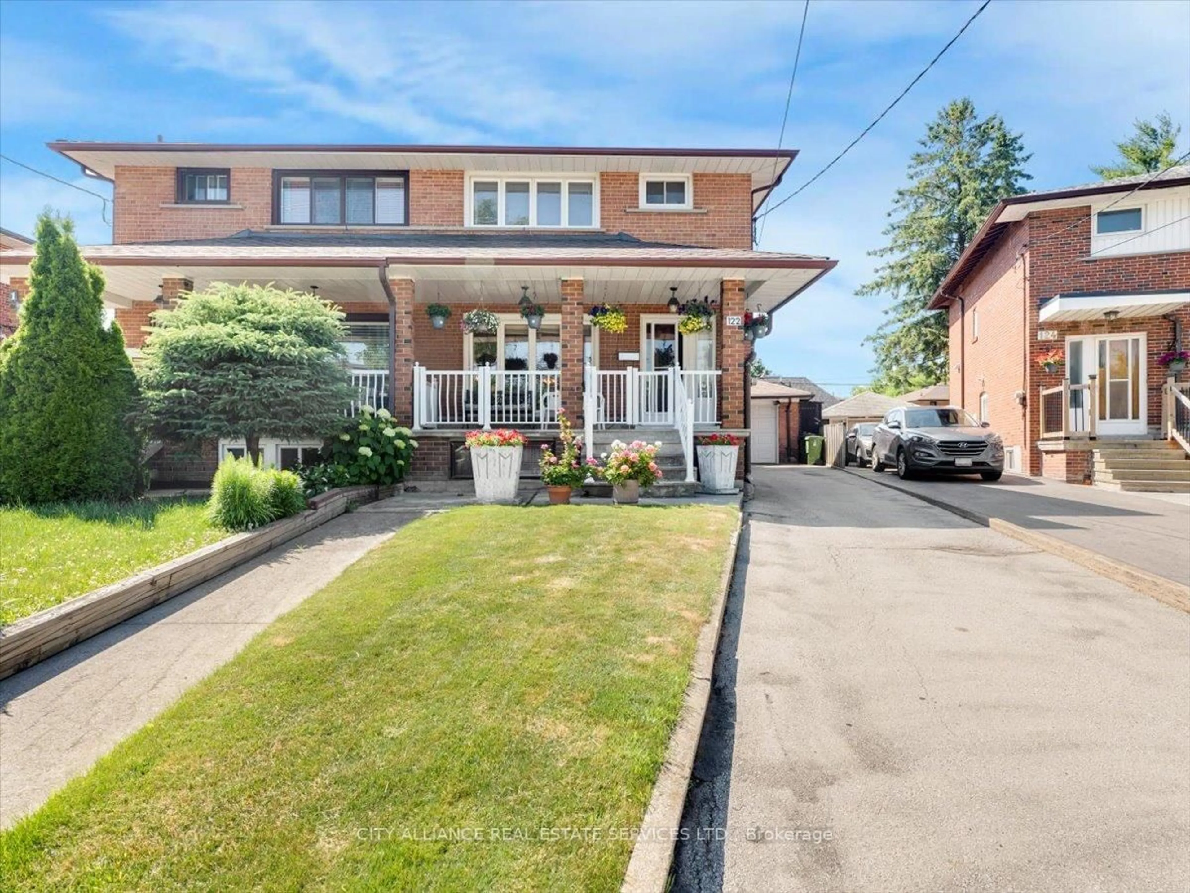 Home with brick exterior material, street for 122 Brookhaven Dr, Toronto Ontario M6M 4P2