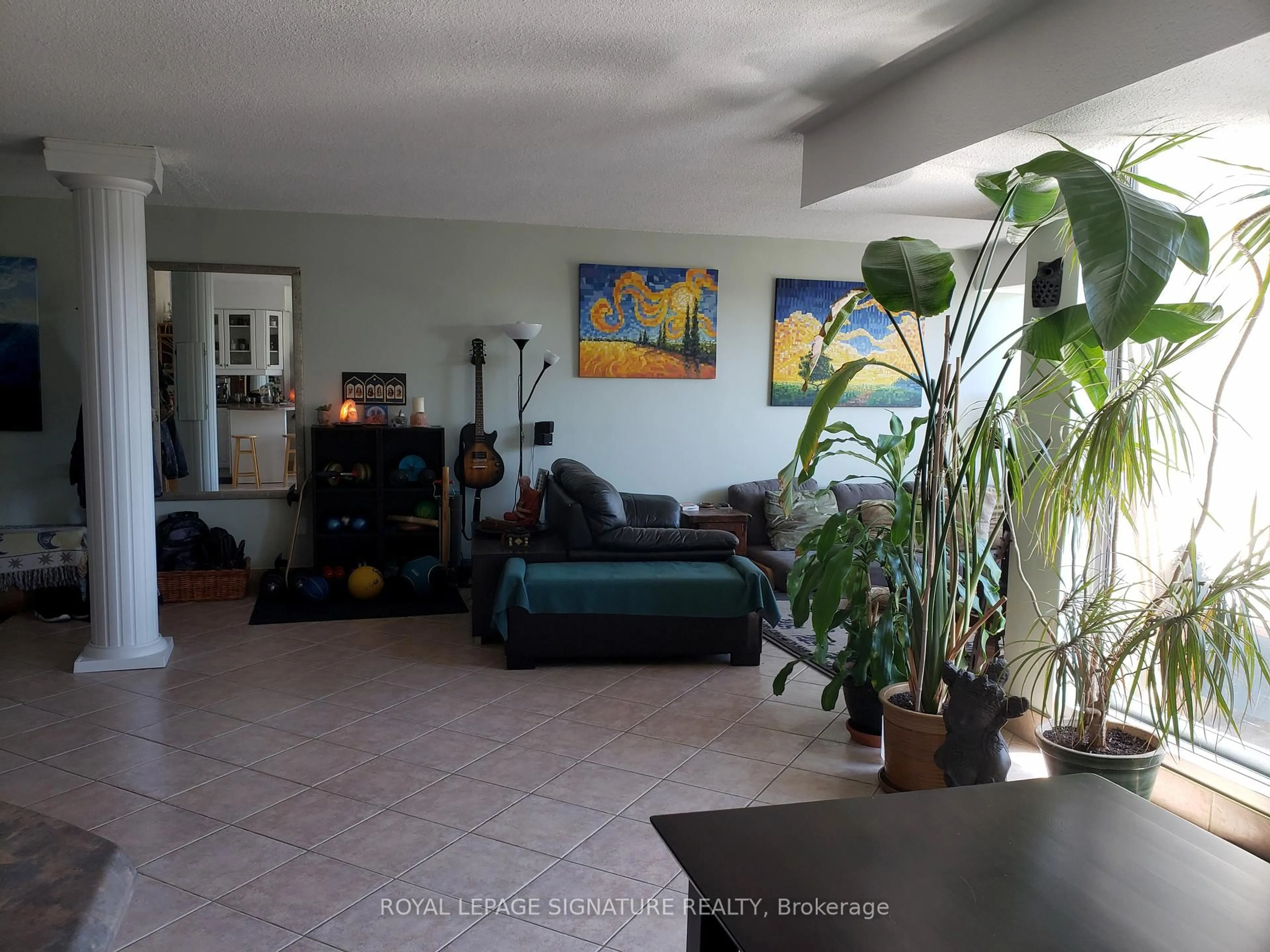 Living room with furniture, unknown for 1300 Marlborough Crt #314, Oakville Ontario L6H 2S2