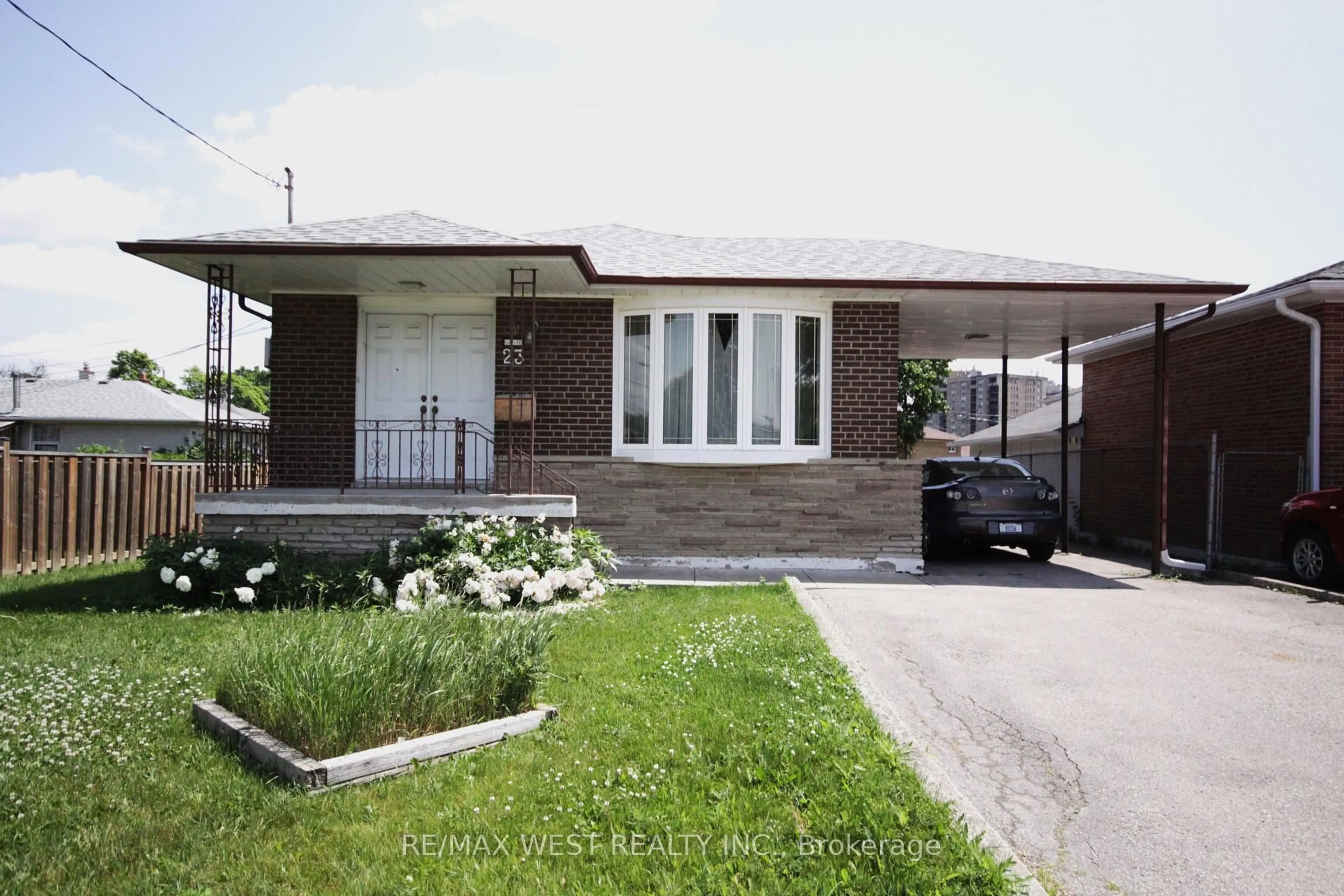 Home with brick exterior material, street for 23 Cove Dr, Toronto Ontario M9W 3V2