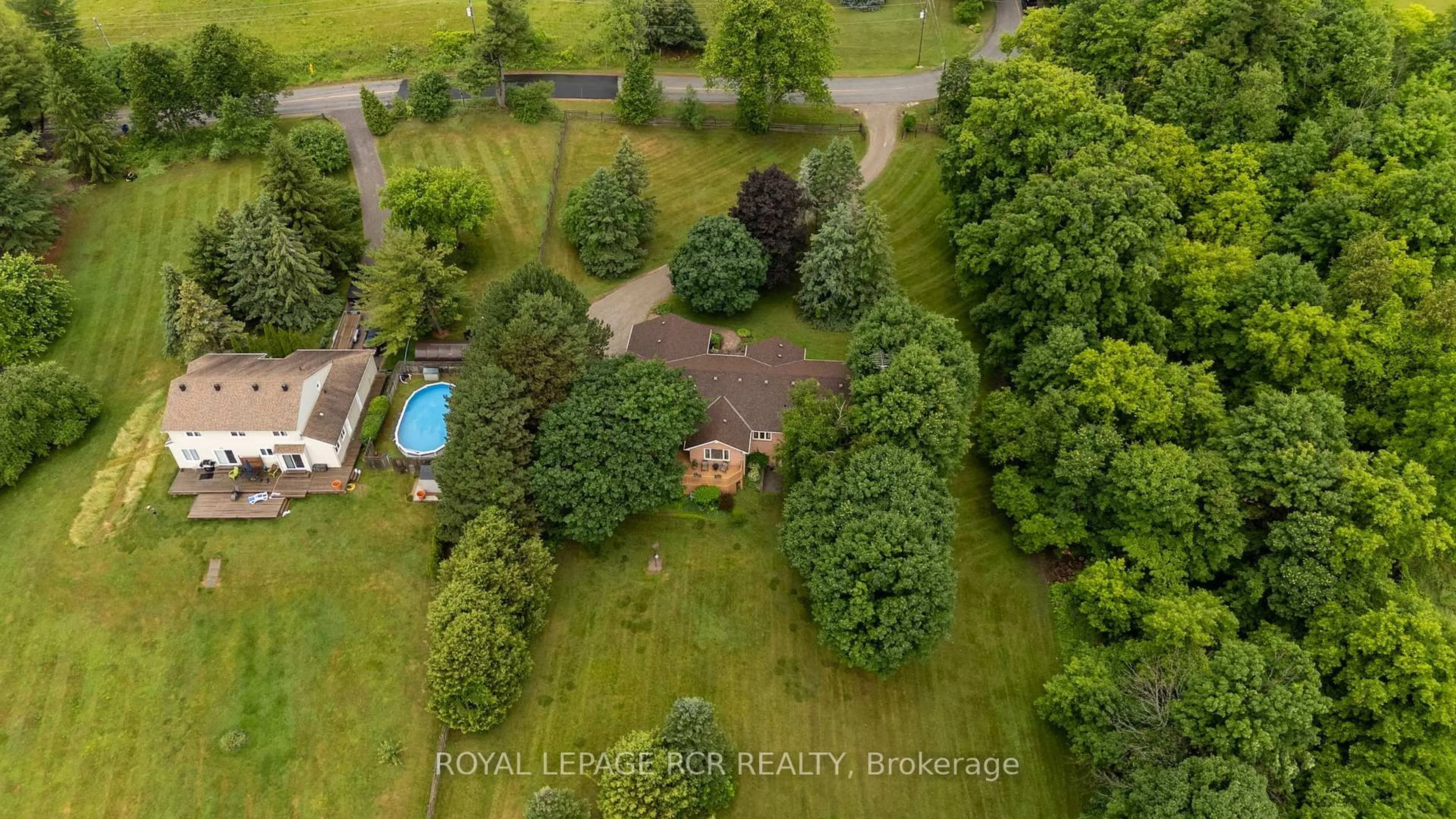 A pic from outside/outdoor area/front of a property/back of a property/a pic from drone, water/lake/river/ocean view for 10989 Halls Lake Sdrd, Caledon Ontario L7E 3R9