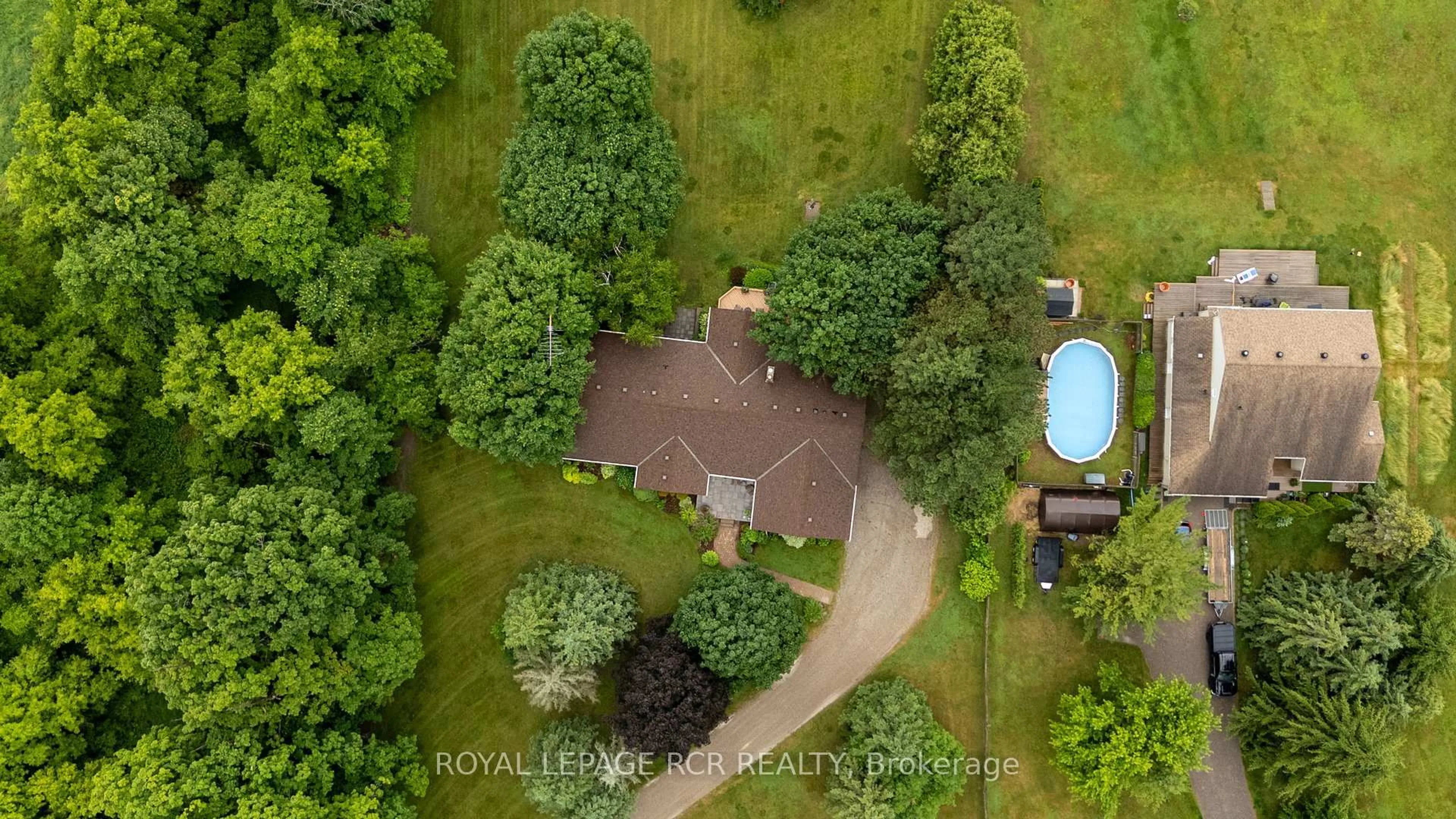 A pic from outside/outdoor area/front of a property/back of a property/a pic from drone, water/lake/river/ocean view for 10989 Halls Lake Sdrd, Caledon Ontario L7E 3R9