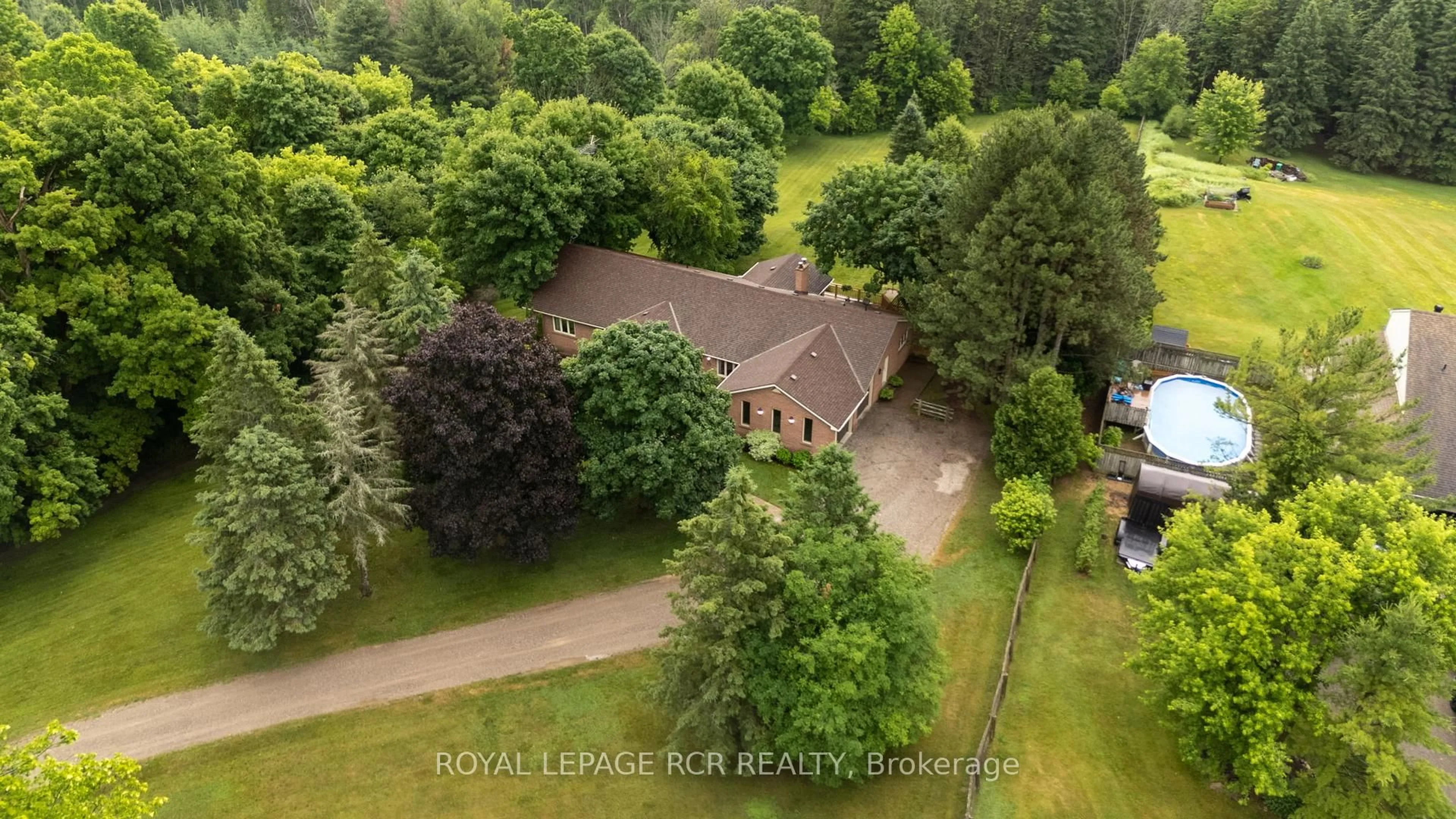 A pic from outside/outdoor area/front of a property/back of a property/a pic from drone, forest/trees view for 10989 Halls Lake Sdrd, Caledon Ontario L7E 3R9