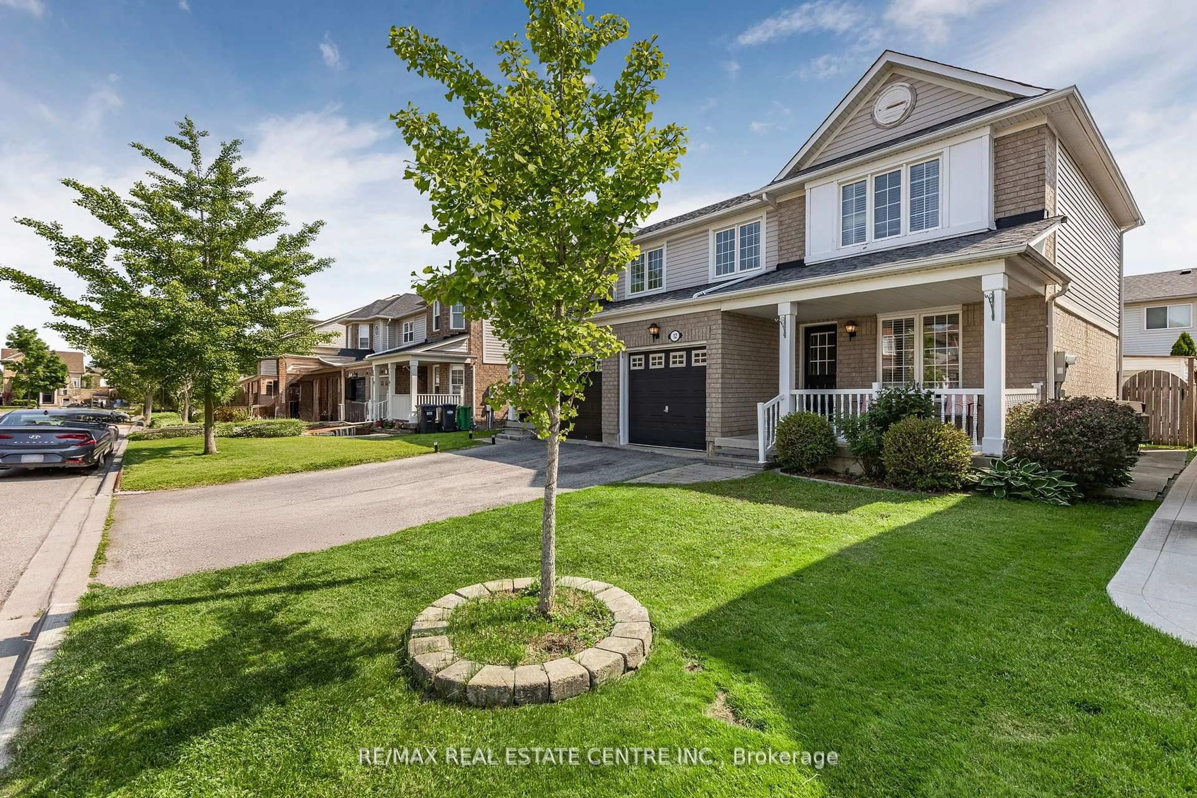 Home with brick exterior material, street for 12 Sentimental Way, Brampton Ontario L7A 2S1