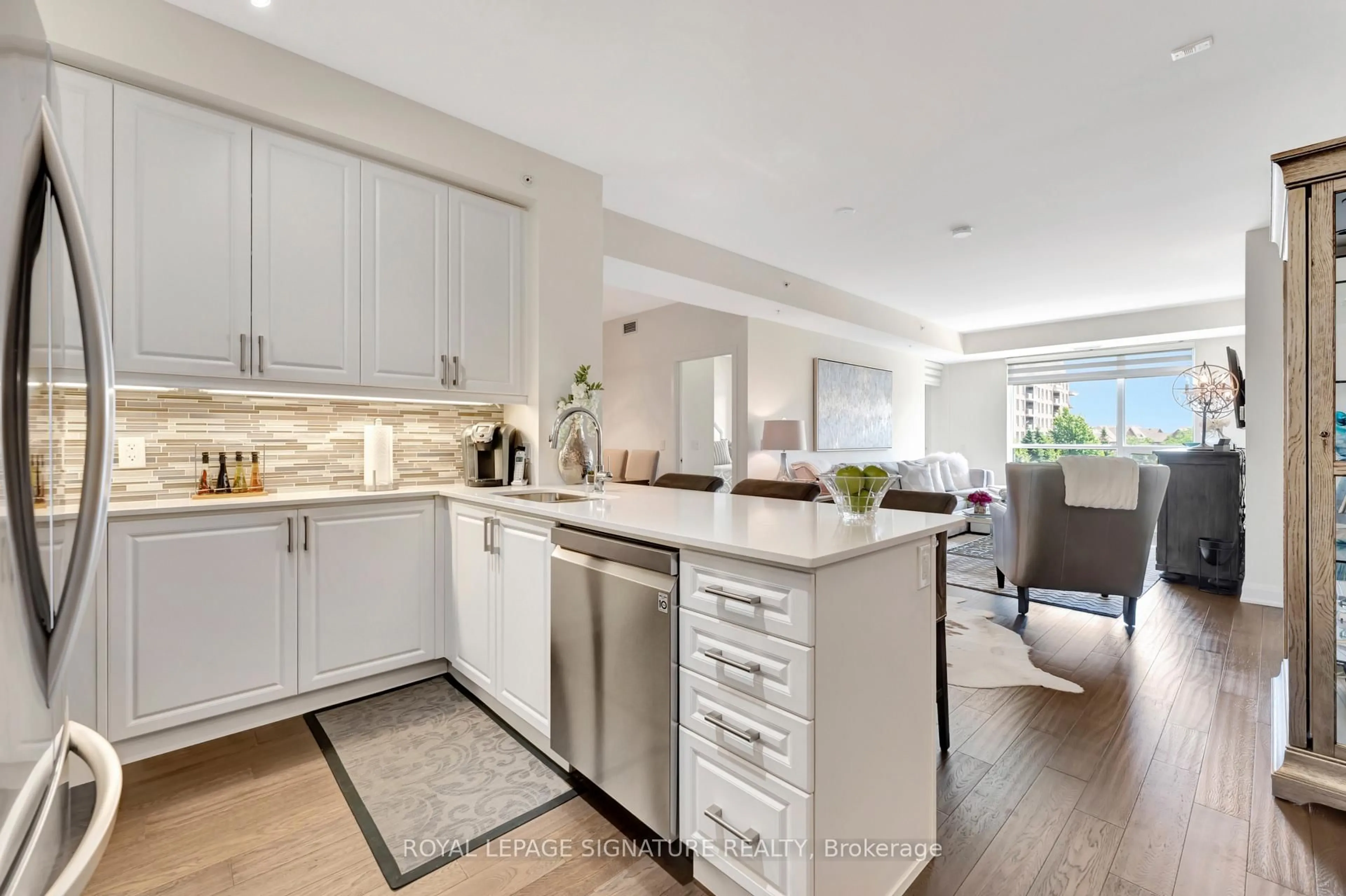 Open concept kitchen, ceramic/tile floor for 2480 Prince Michael Dr #306, Oakville Ontario L6H 0H1