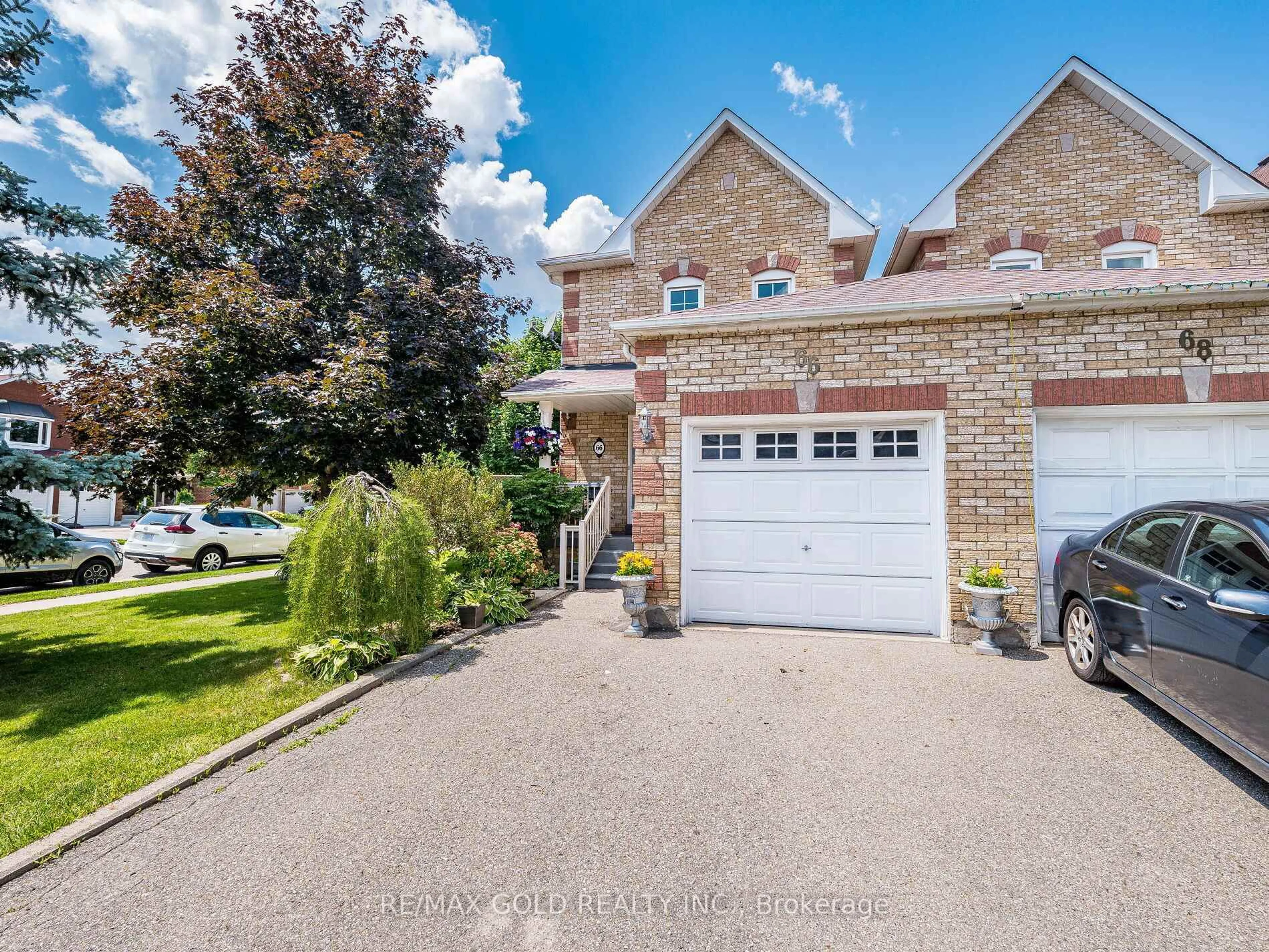 Home with brick exterior material, street for 66 Muirland Cres, Brampton Ontario L6X 4P3