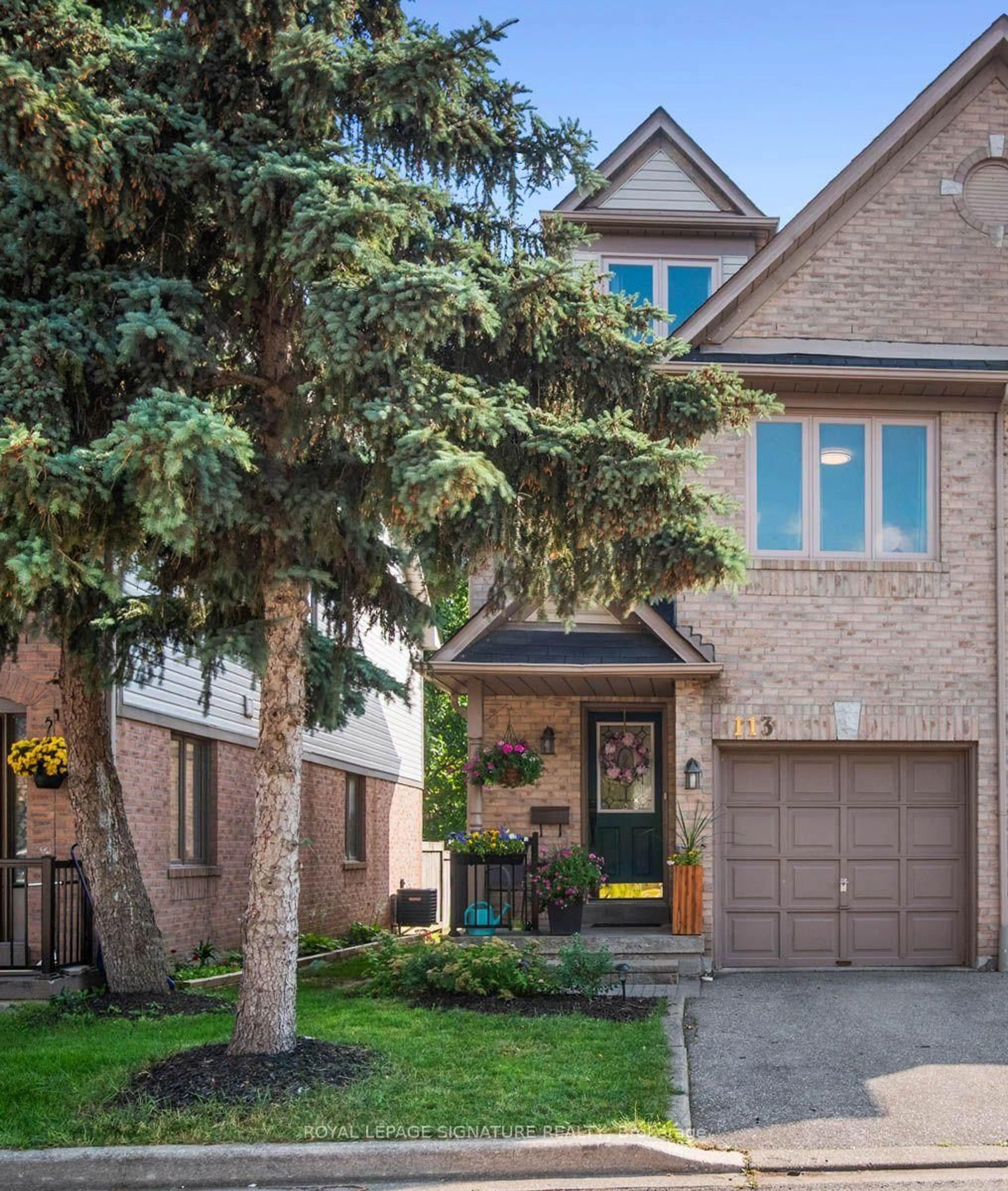 Home with brick exterior material, street for 1292 Sherwood Mills Blvd #113, Mississauga Ontario L5V 1S6