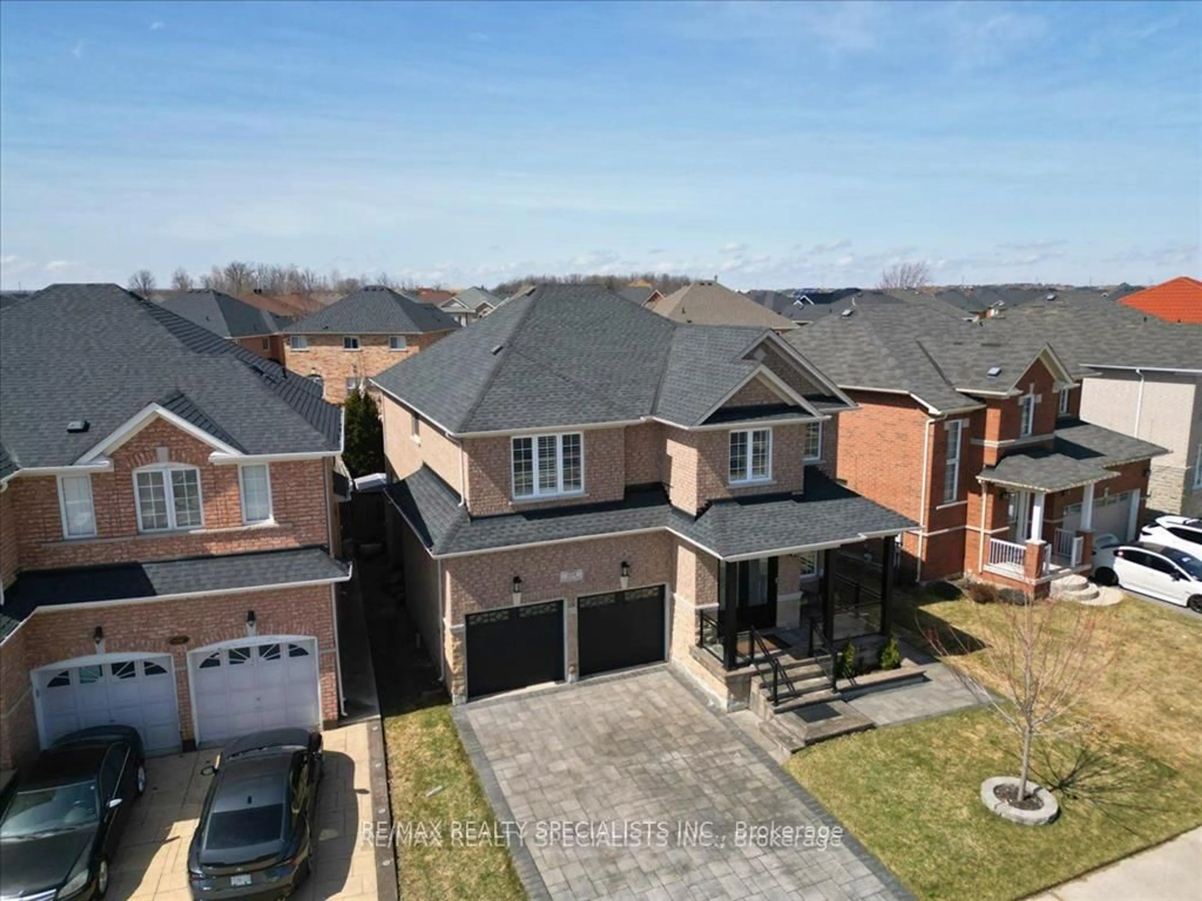 A pic from outside/outdoor area/front of a property/back of a property/a pic from drone, street for 104 Earlsbridge Blvd, Brampton Ontario L7A 3W7