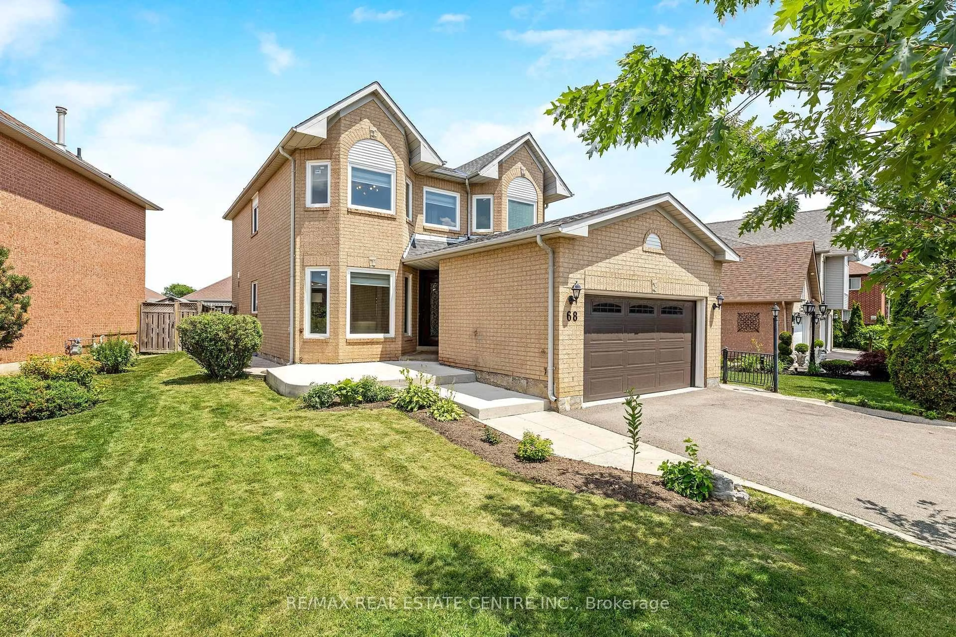 Home with brick exterior material, street for 68 Summerfield Cres, Brampton Ontario L6X 4L2